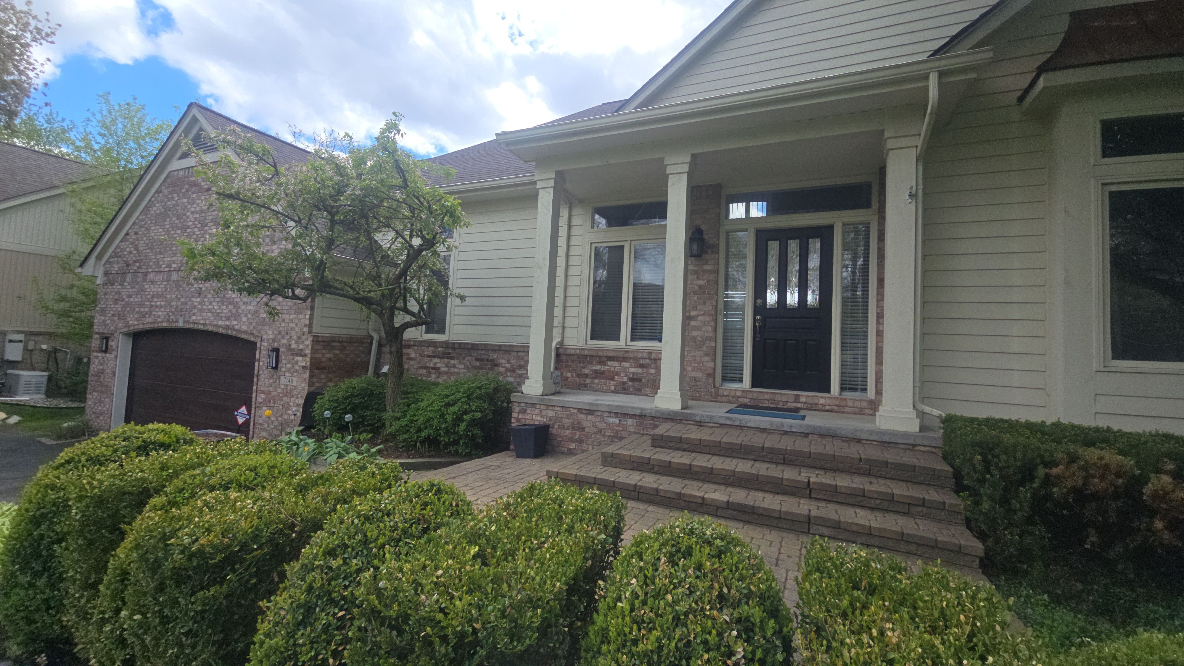 Exterior Wood Rot Repair and Trim Restoration in White Lake by Top Shelf Painter