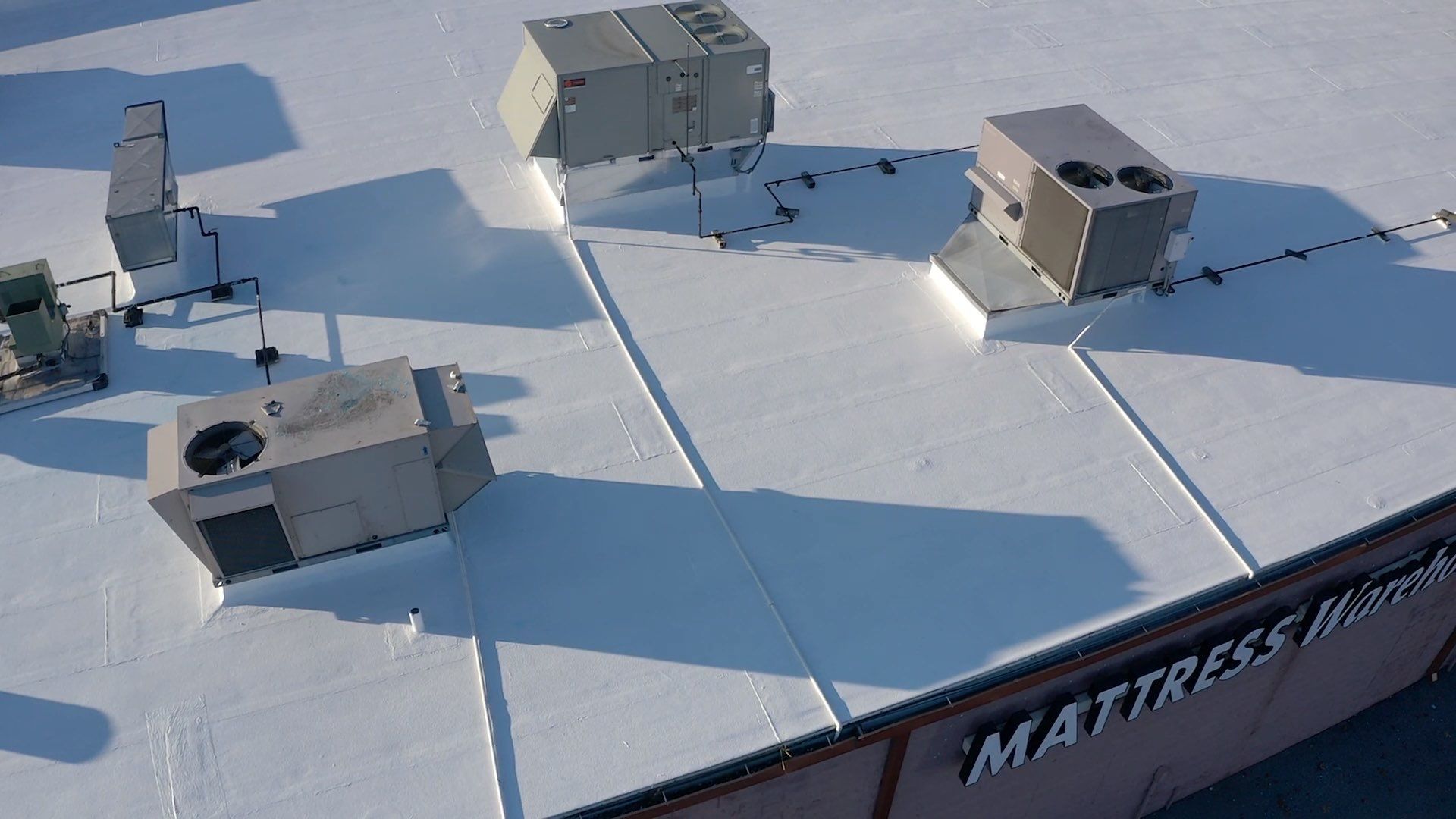 Commercial Coating using Poly Urerthane and Silicone Coating by Just In Time Roofing and Restoration