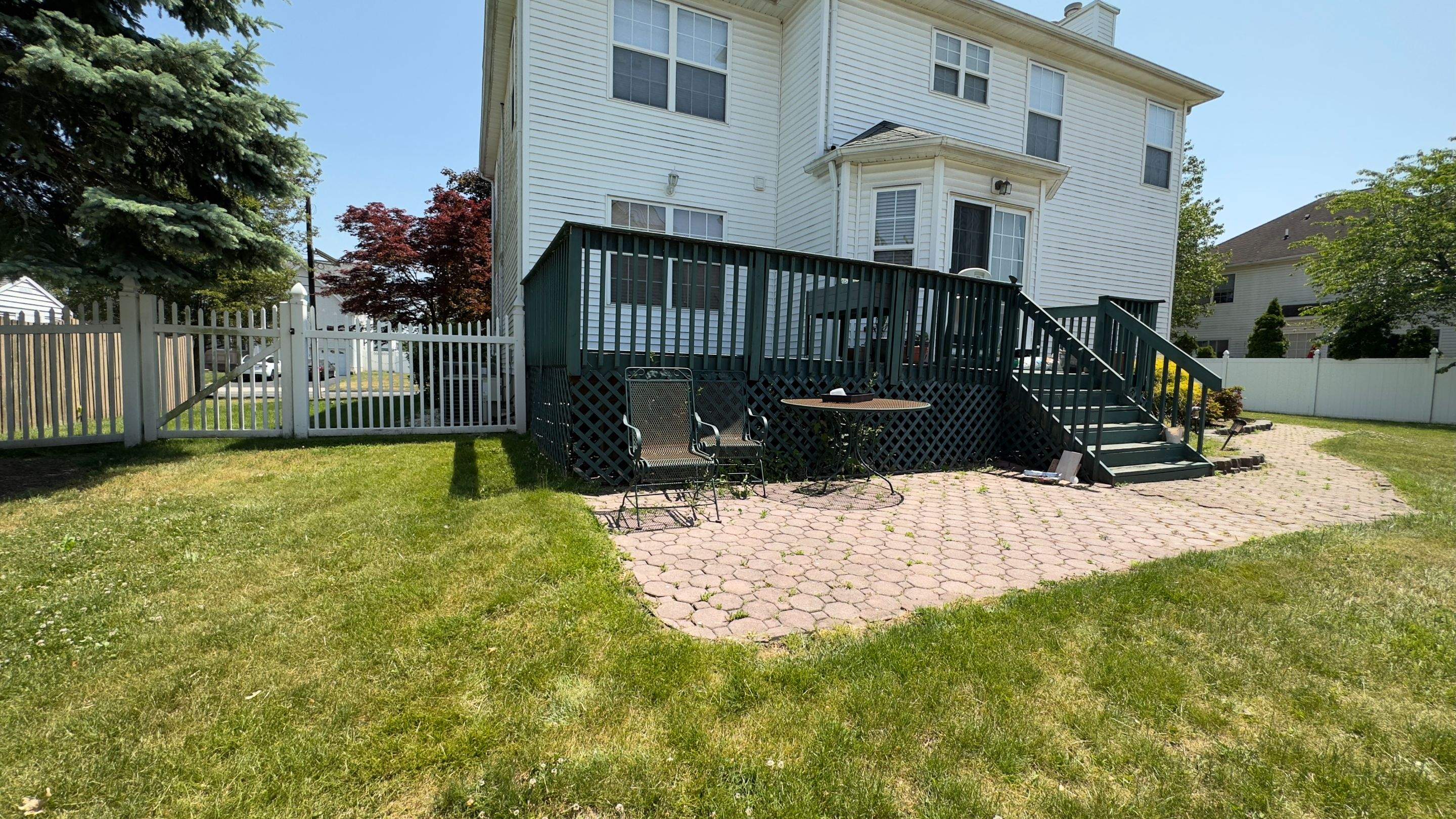 New Deck with Pergola and Vinyl Lattice by deck guardian