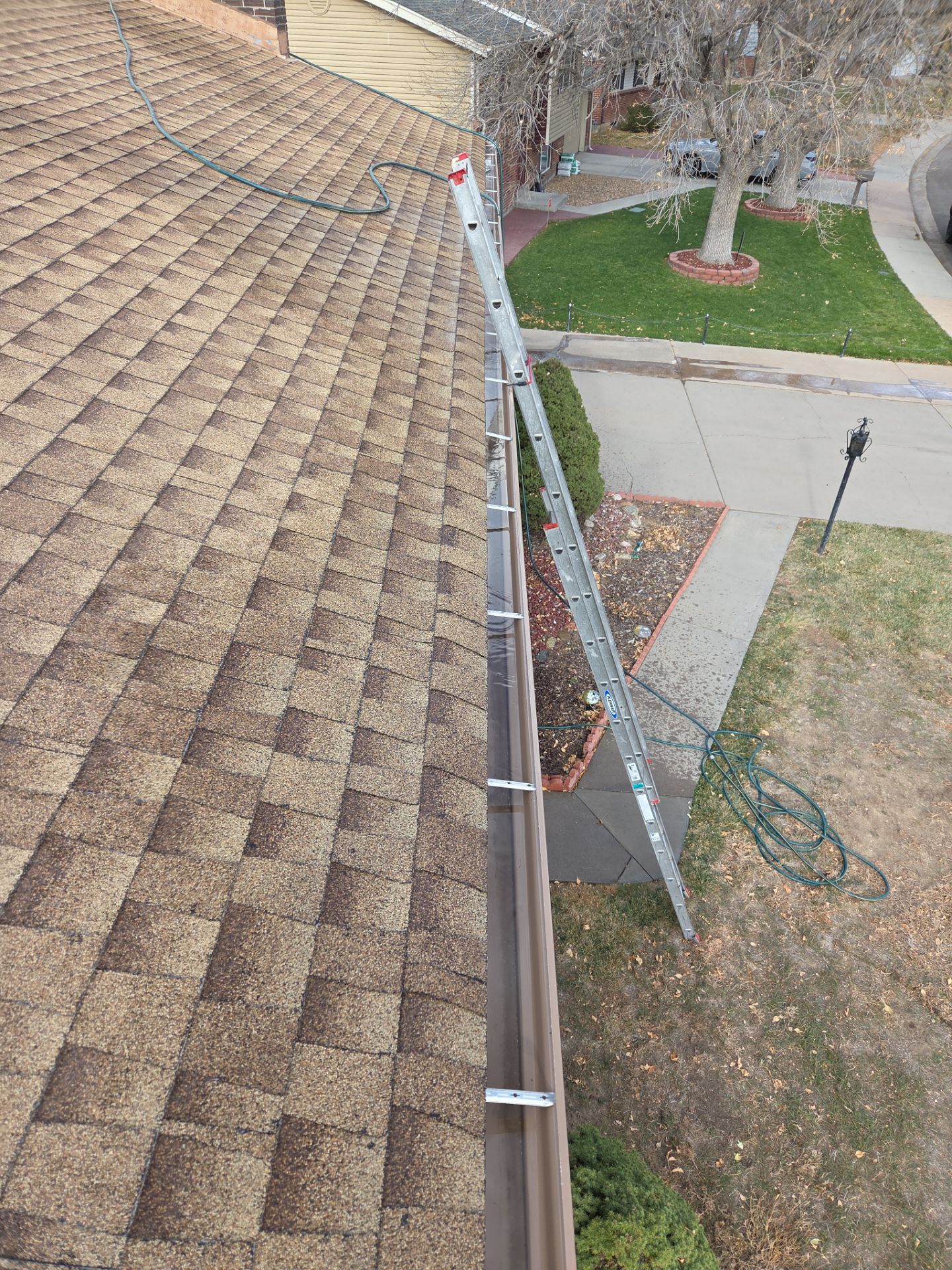 Gutter and Downspout Cleaning by RTP Roofing Company