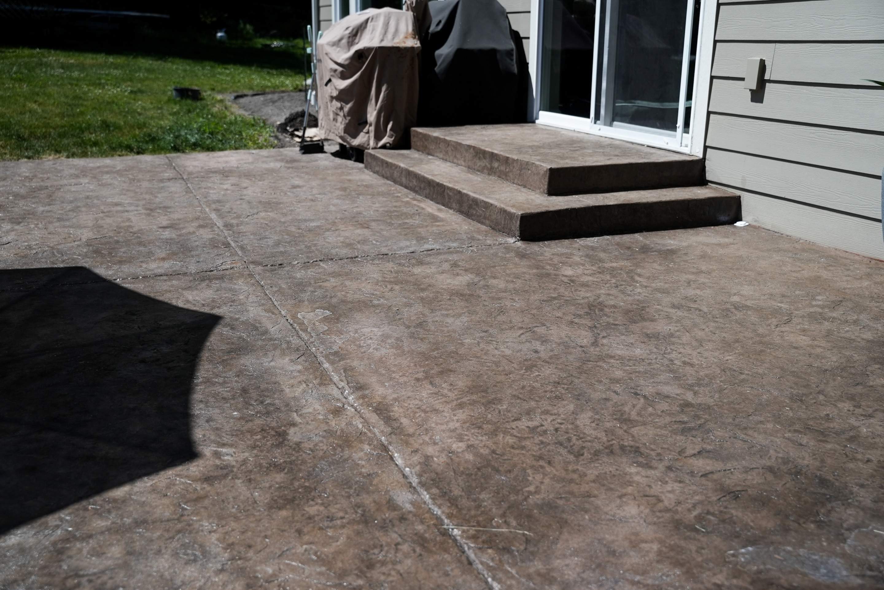 Mandy | Stamped Concrete Patio & Driveway by Jireh Asphalt & Concrete Inc 