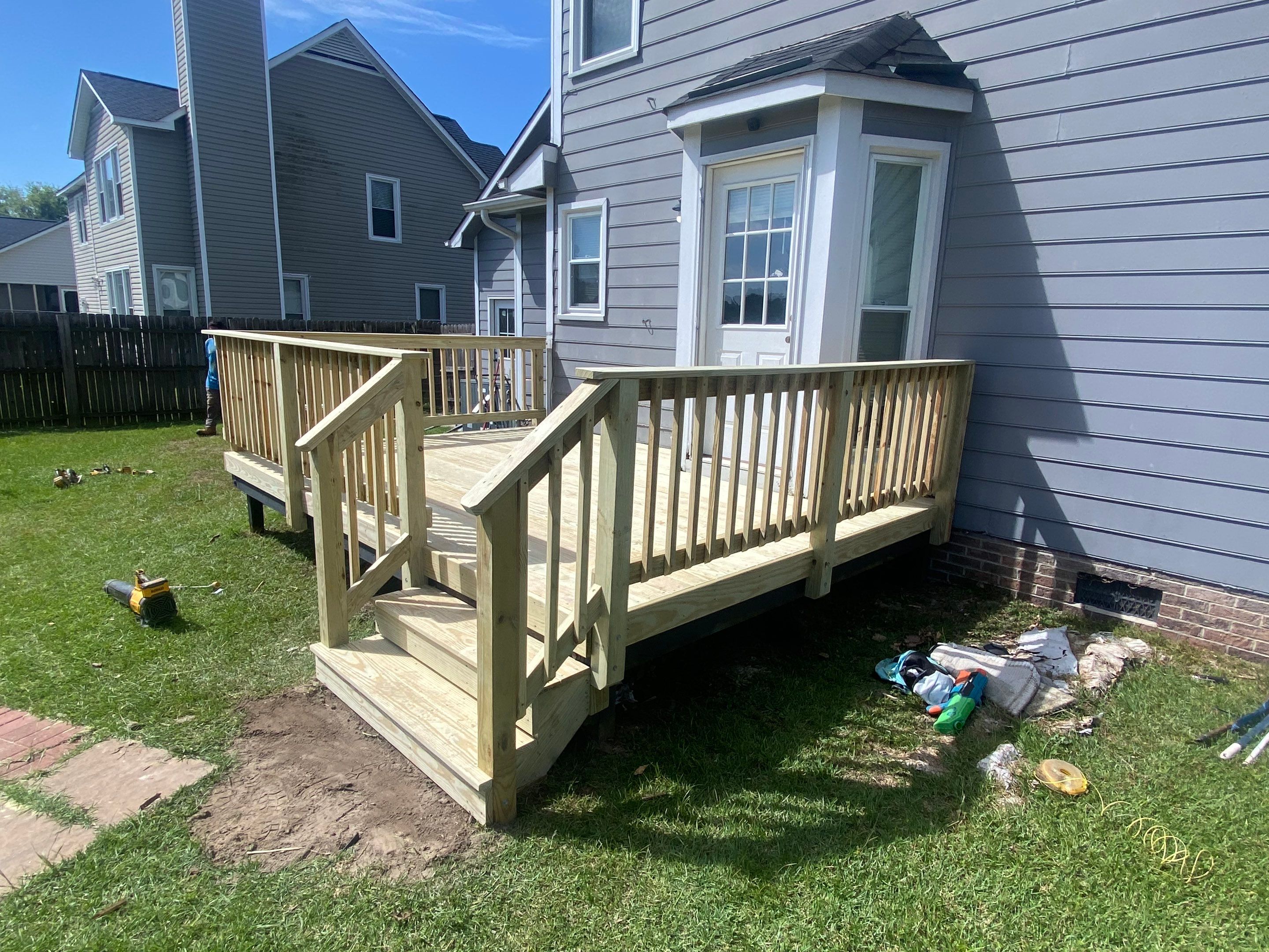 Pressure-Treated Wood Deck Resurface and Trim Repair in Fayetteville by The Remodeling Company