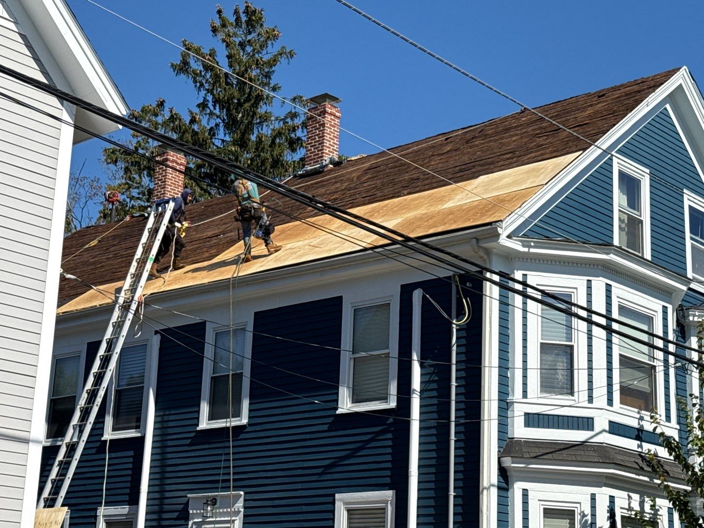 Half Roof Replacement for Solar Installation – Townhouse with New Plywood Decking by Sensible Home Solutions