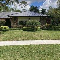 24ga 1.5" Snap-Lock Dark Bronze by Total Roofing System The Metal Roof Experts