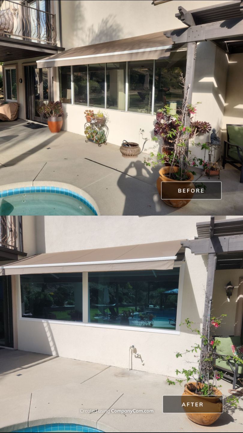 Window Installation using Anlin vinyl windows with Sunshield glass by American Window Company