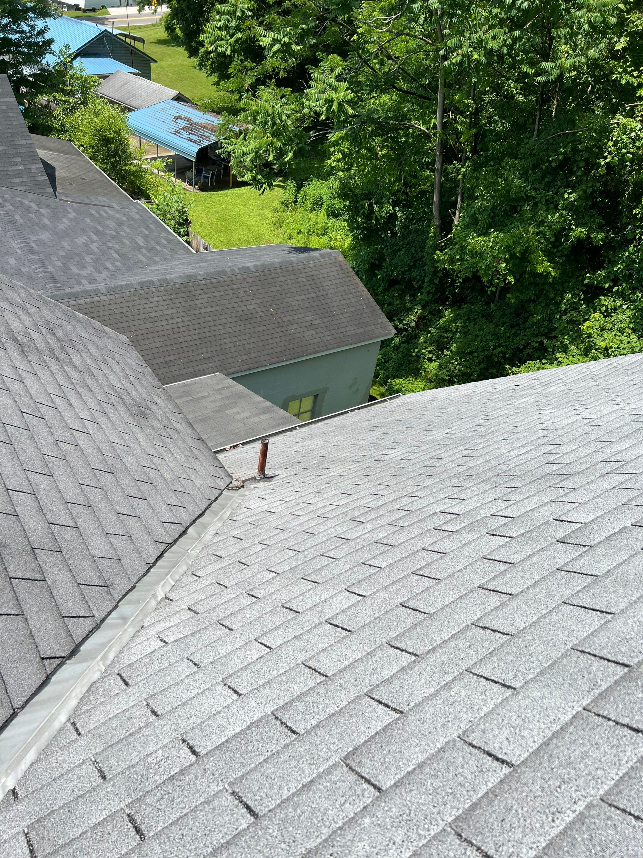 Residential Roofing Installation using Certainteed Landmark Shingles Moire Black Color by Secure Construction Company Inc