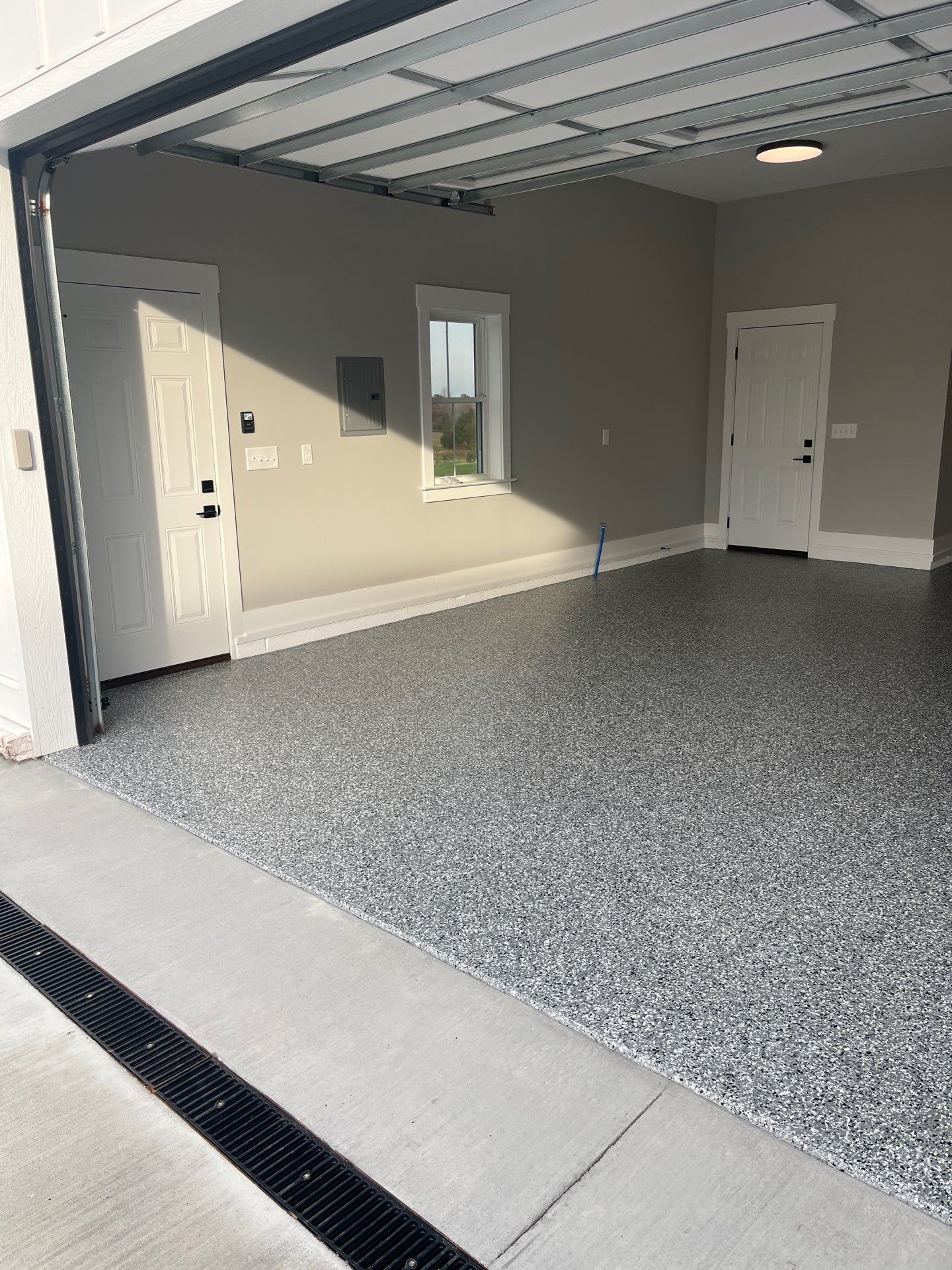 Garage Floor Coating using Wombat by My Garage Floor Guys