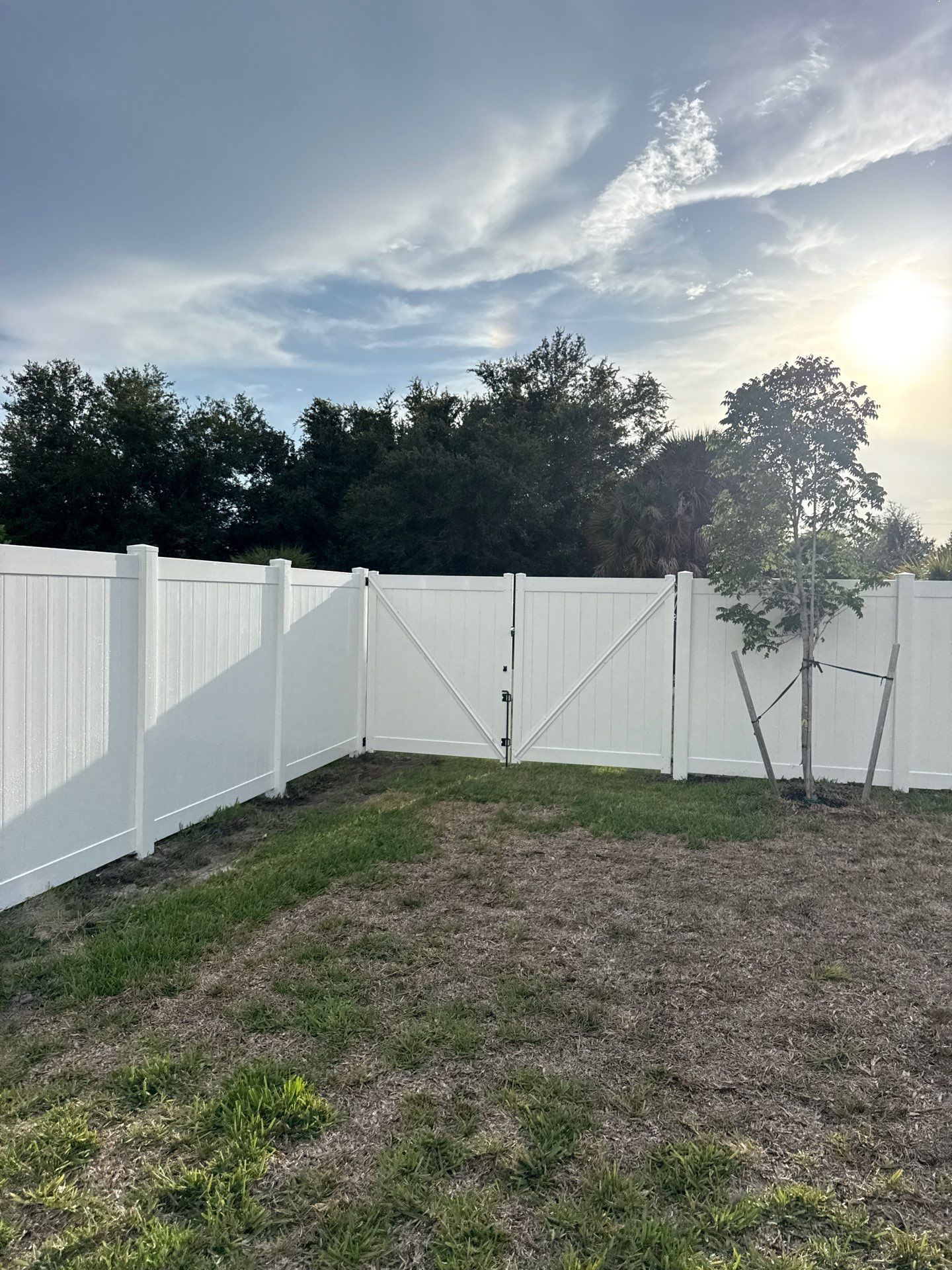 Residential Vinyl Privacy Fence Installation in Port Charlotte by True Fence LLC