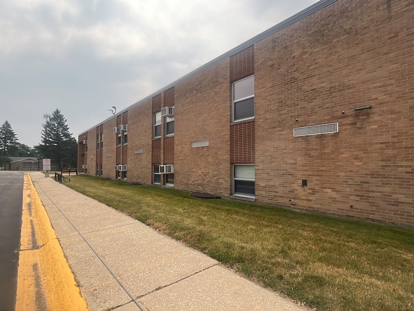 Commercial brick exterior cleaning by Northern Power Washing LLC.