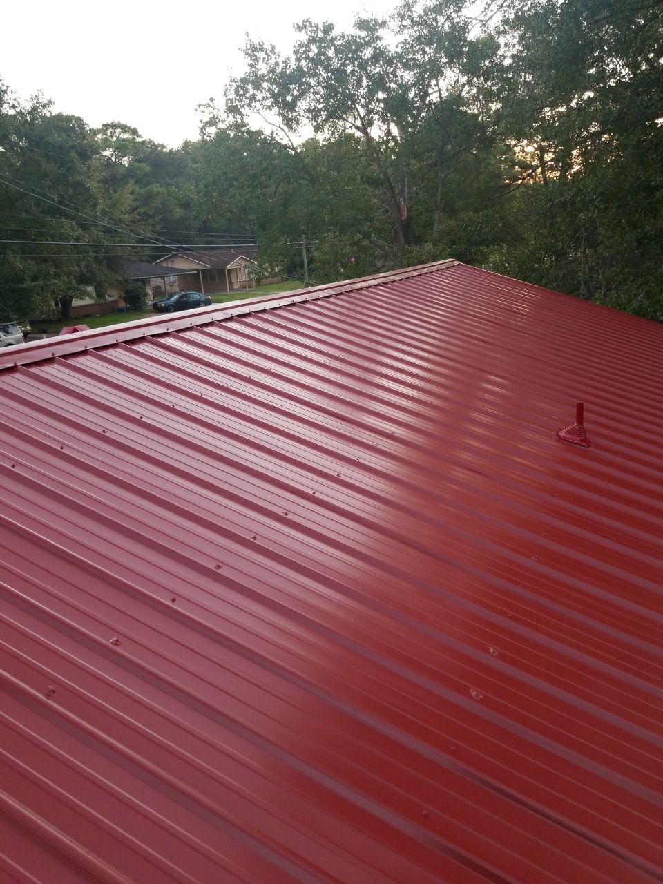 Residential Roofing Installation using Metal roofing by American Roofing & Construction LLC