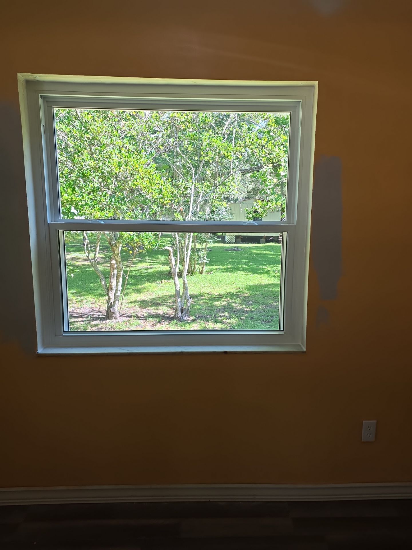 White Vinyl Window Replacement for Residential Home in Williston by Windows & Doors Store