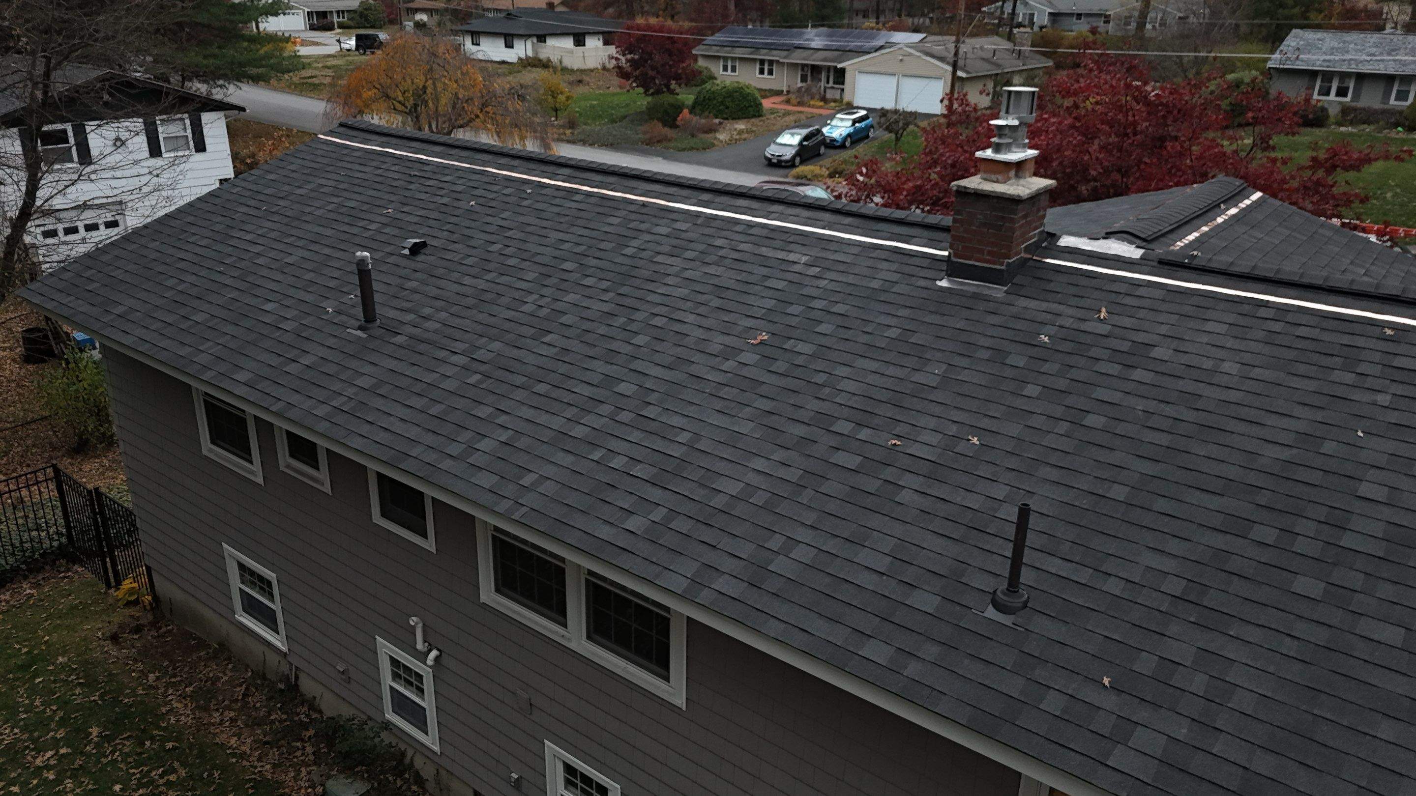 Chelmsford Complete Roof Replacement in Onyx Black with Balanced Ventilation by Mighty Dog Roofing of Greater Middlesex County