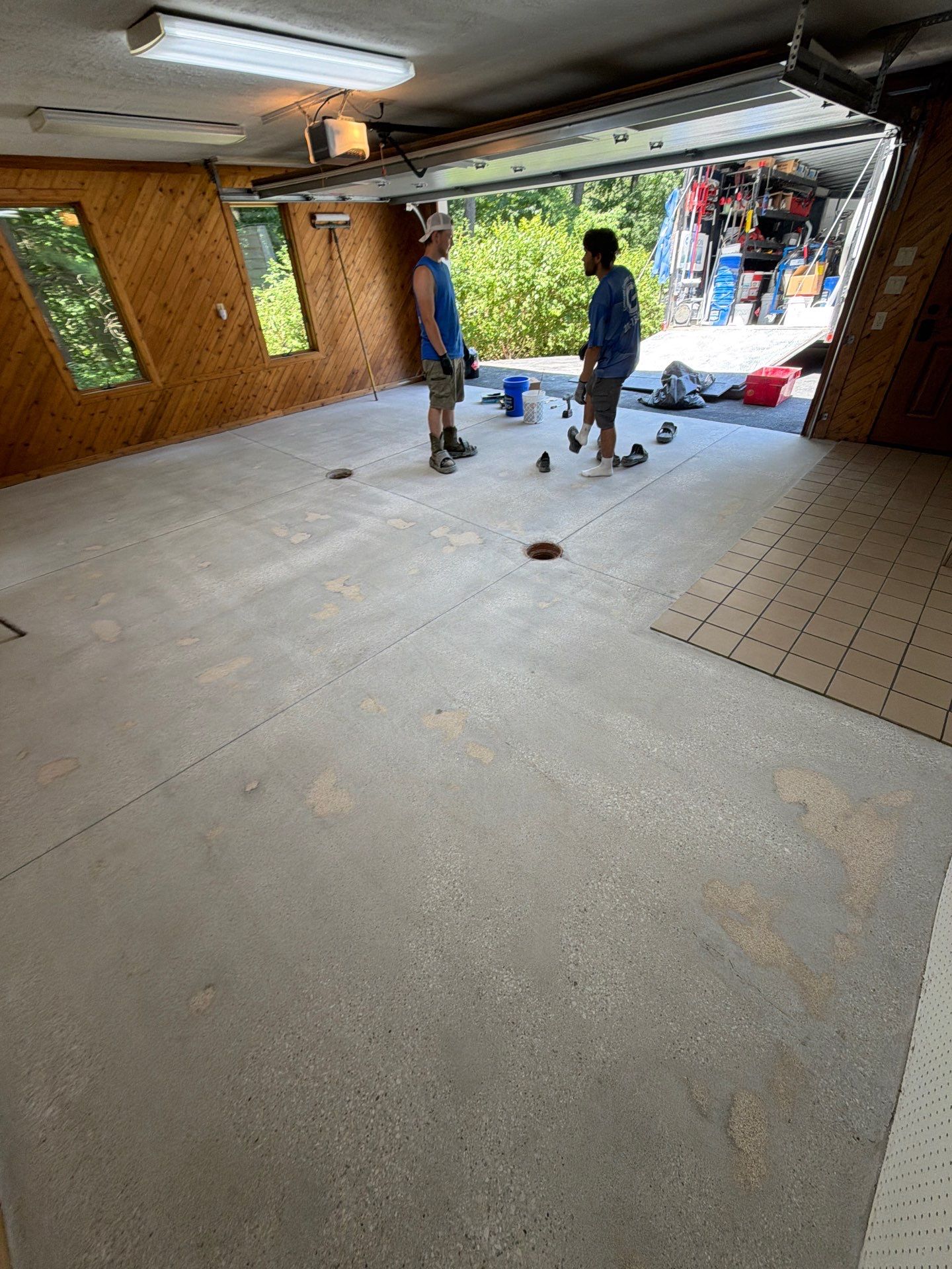 Grand Haven Garage Epoxy Floor Coating with Wax Wing Flake by Gordon Painting