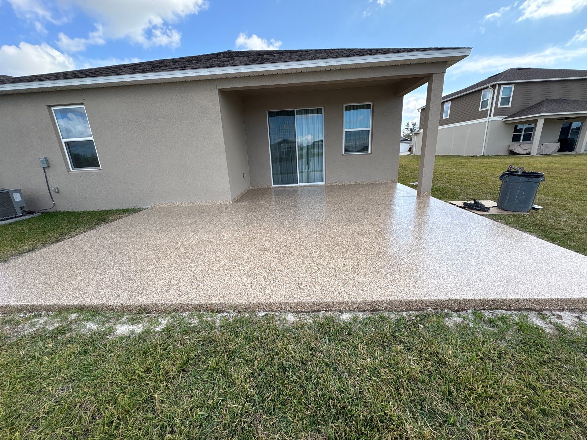 Outdoor Living Upgrade: 'Outback' Flake System for a Premium Patio Finish by Performance Floors & Coating