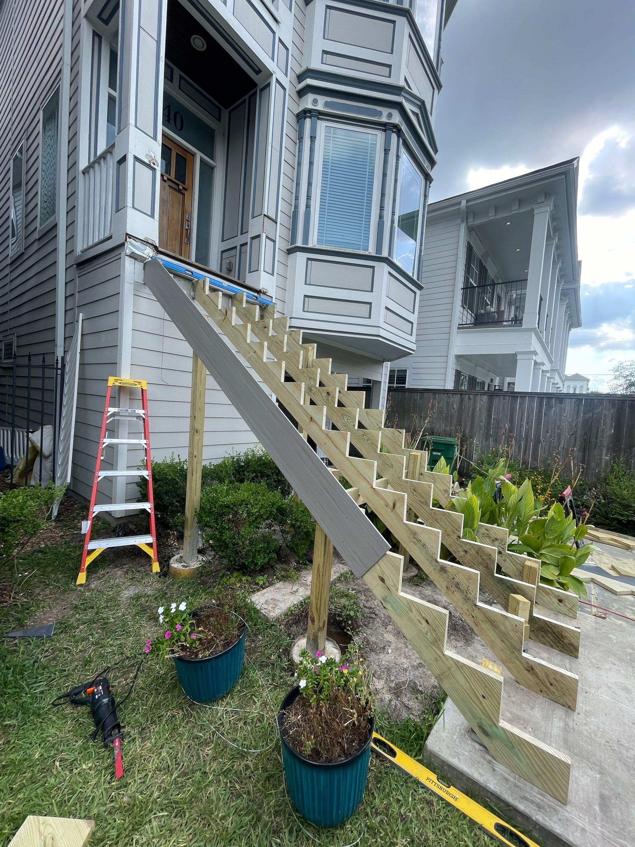 Timbertech Staircase with a 50 year warranty and solar lighting by Majesty Construction