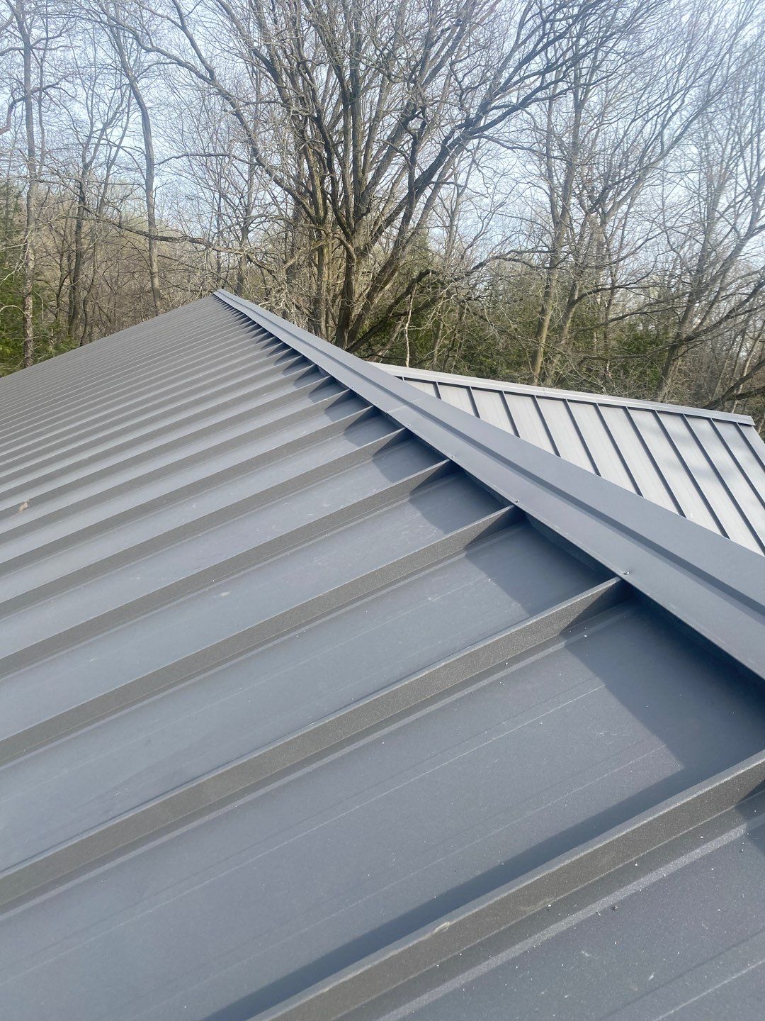 New Roof Installation using 16" Standing Seam Panels by Jay Carter Roofing & Sheet Metal