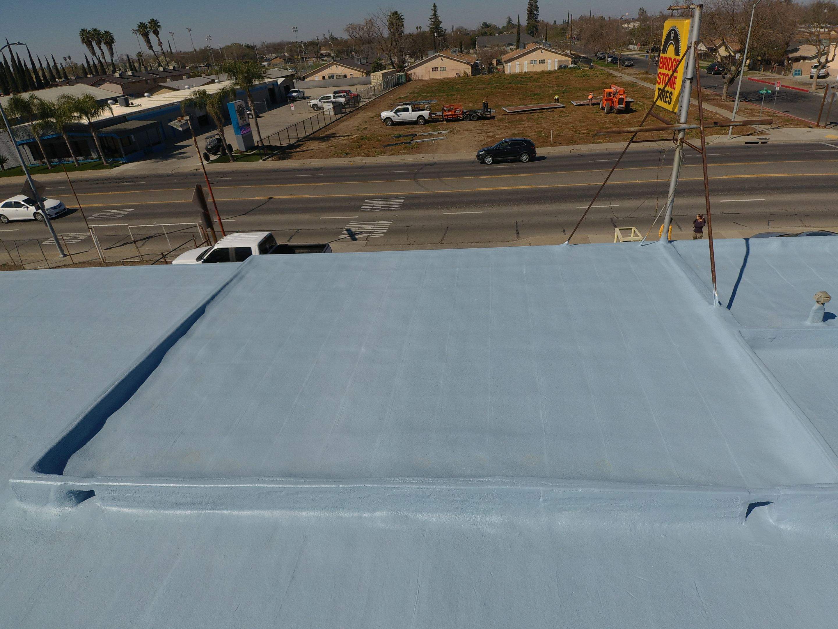 Spray foam and coatings using Conklin Benchmark/PUMA XL coatings and spray foam by Straight Edge Roofing Inc