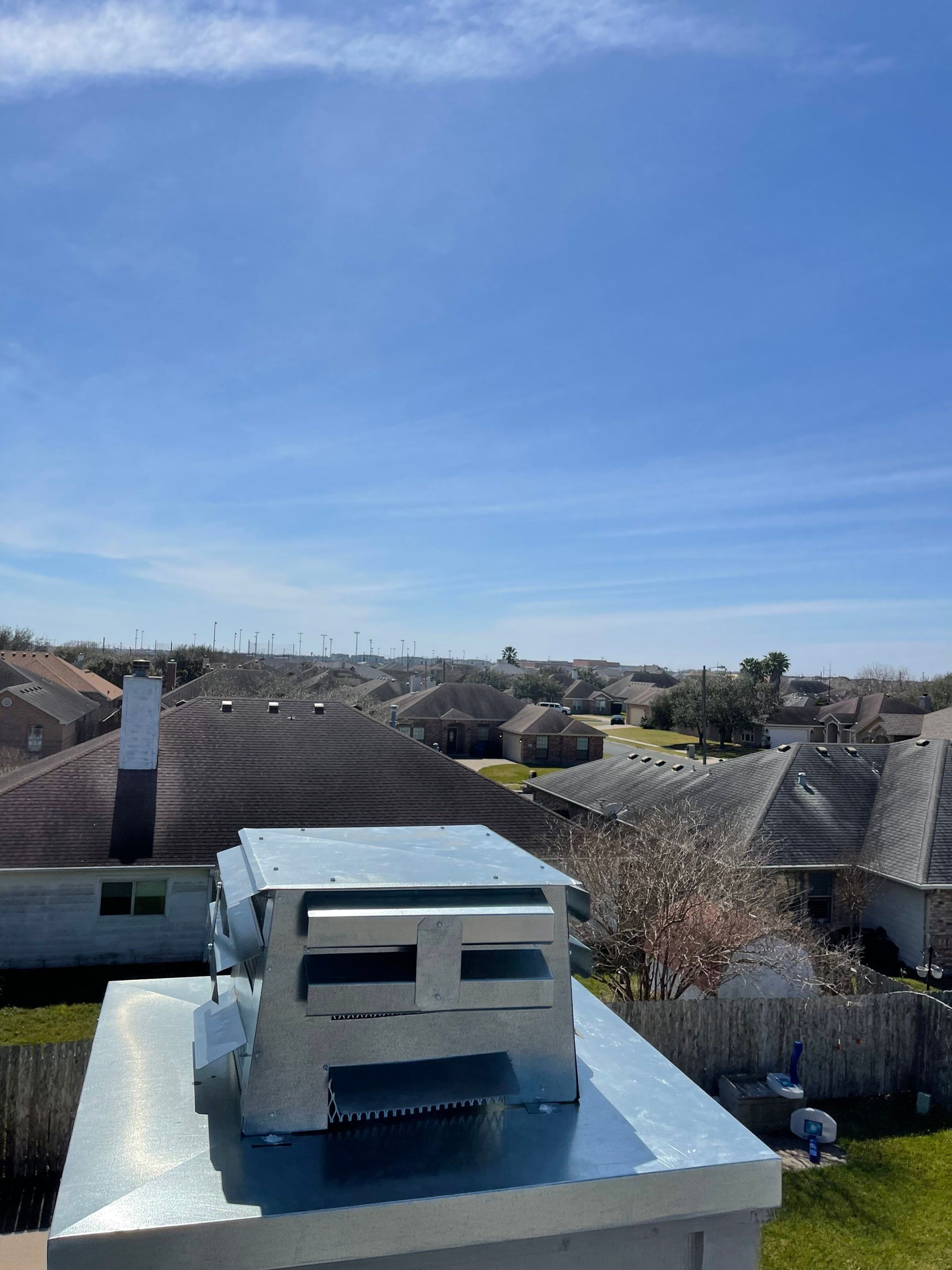 Residential Roofing Repair Replacing Chimney Cap by Lighthouse Roofing