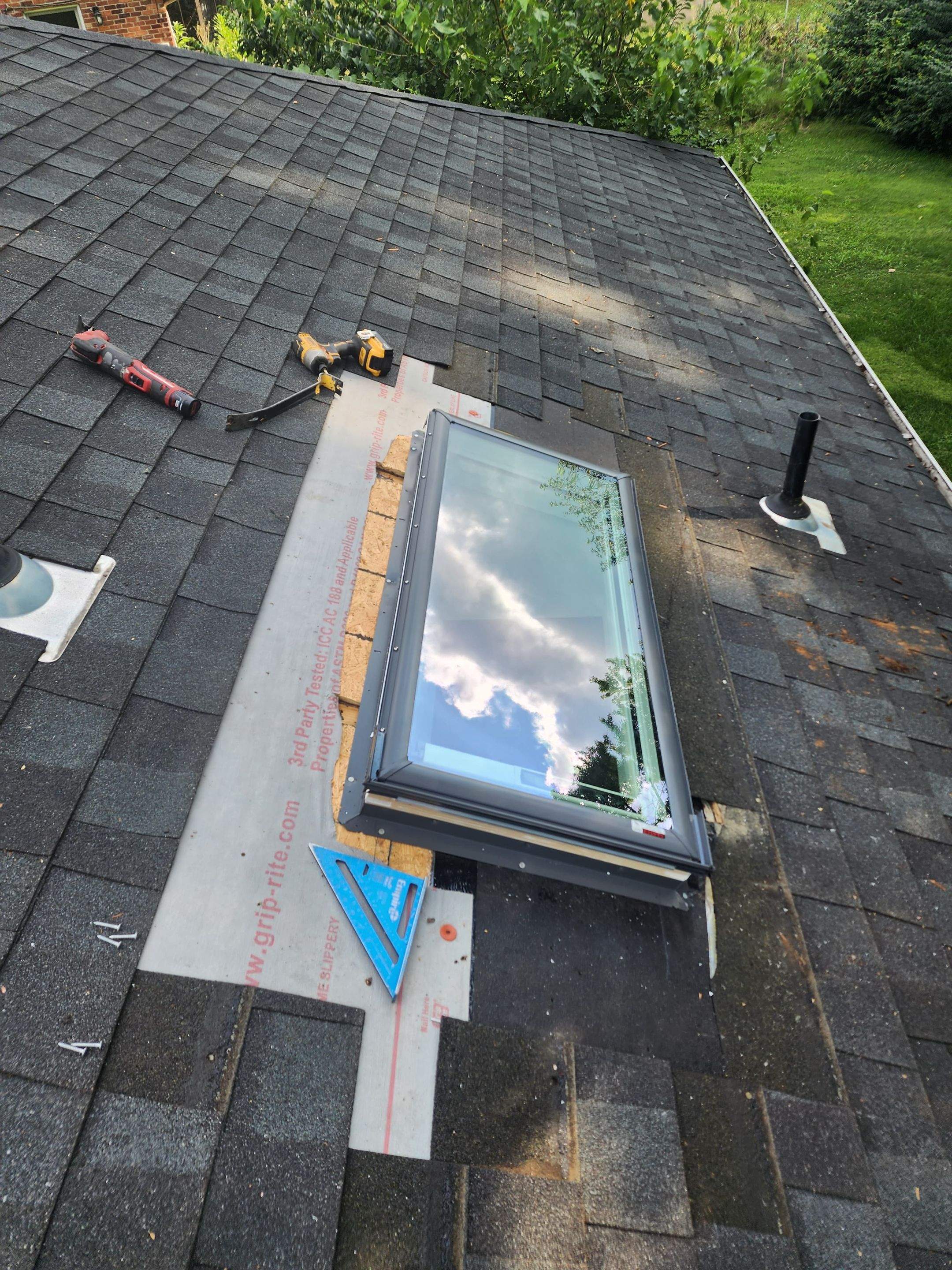 Dayton Skylight Replacement and Shingle Repair for Leaking Roof by Level Up Roofing and Restoration Services LLC