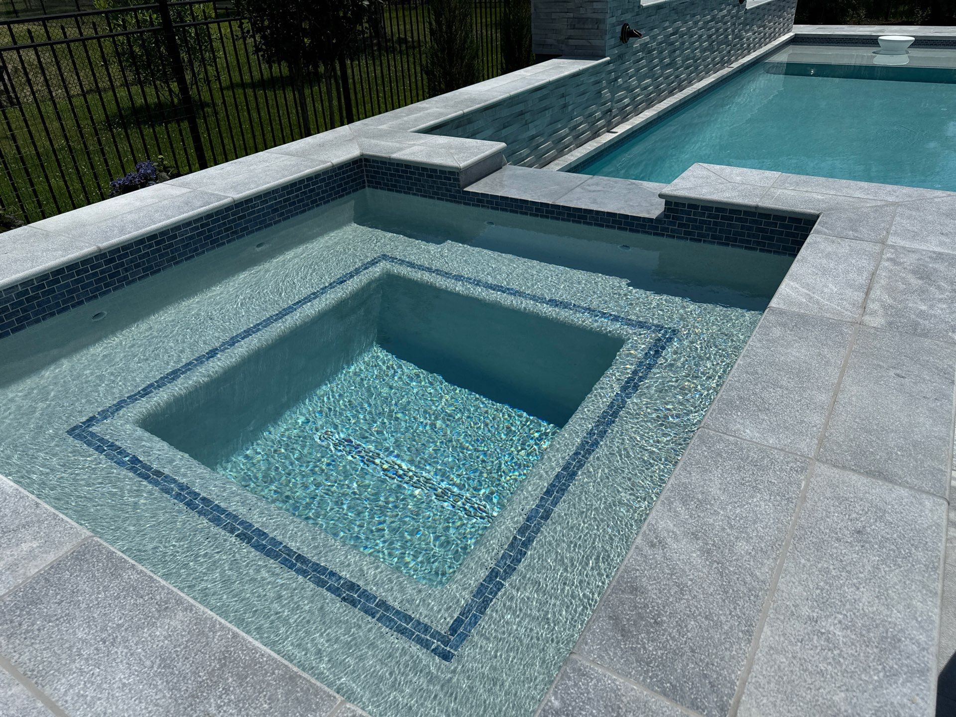 Gunite Pool w/ Spa and Water Features by Elysium Pools