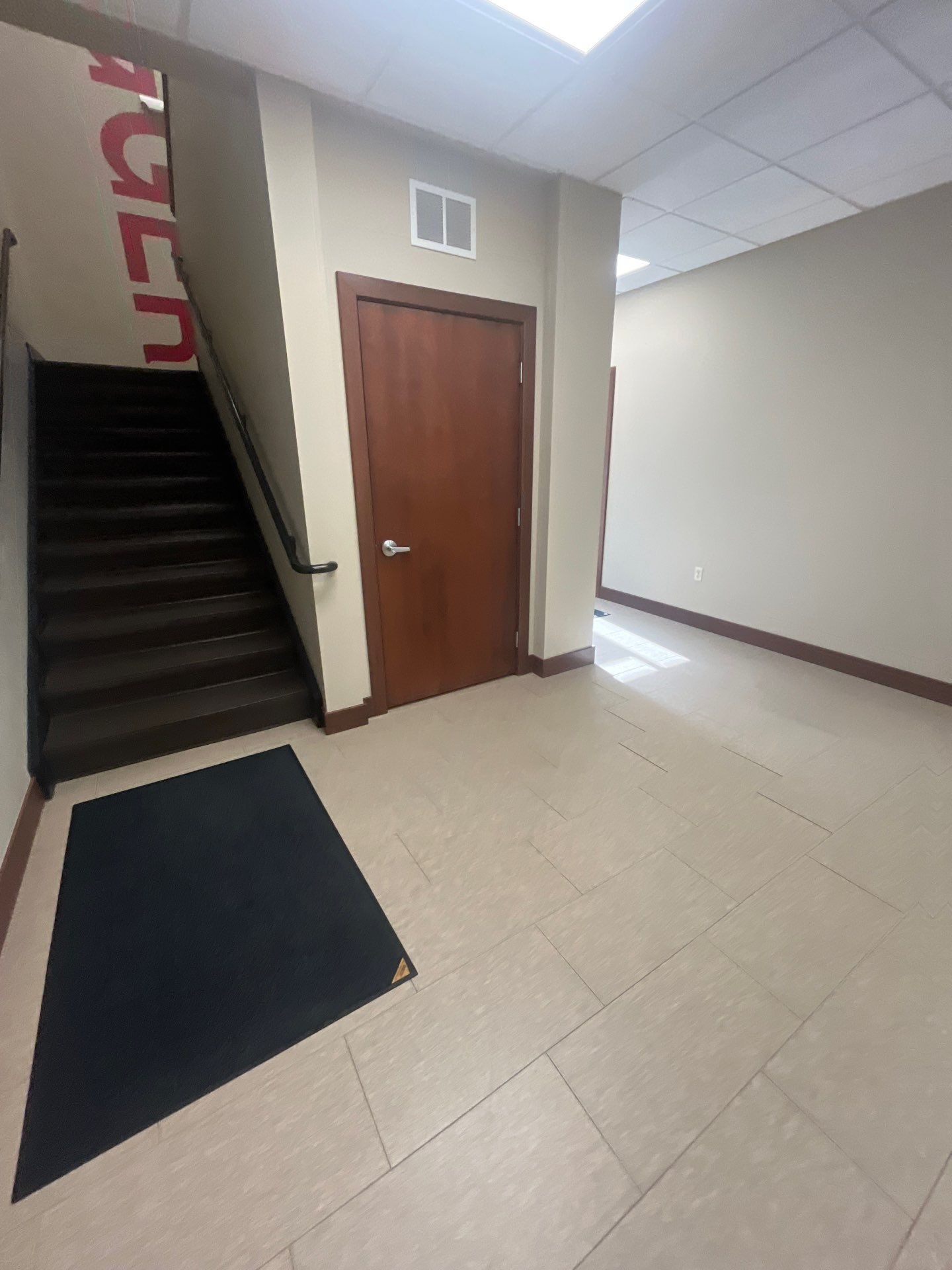 Commercial Office Interior Remodel and Modern Suite Refresh in Sioux Falls by Select Painting, Coatings & Garage Cabinets