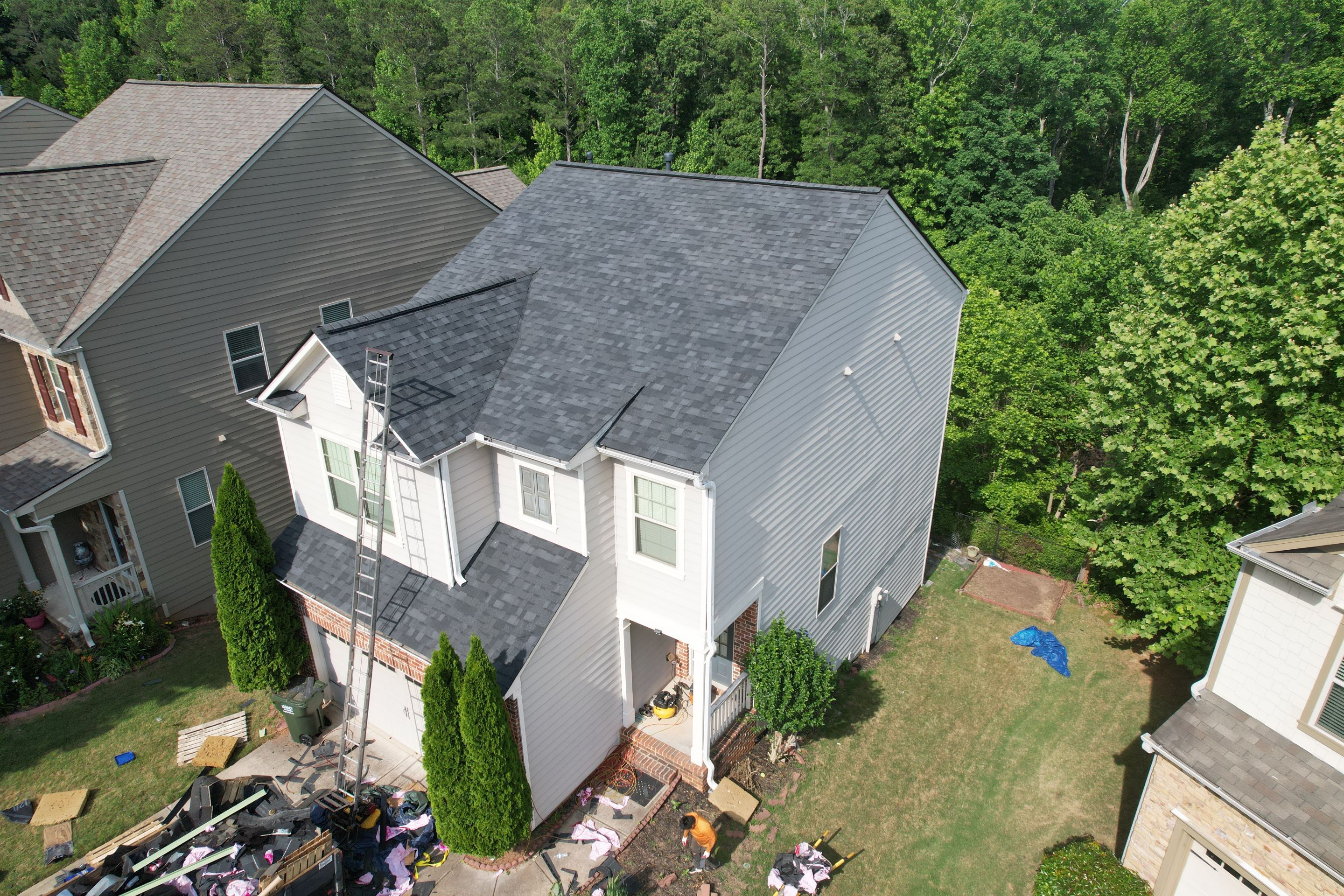 Residential Roof Replacement using Owens Corning Trudef Twilight Black by Inspector Roofing and Restoration
