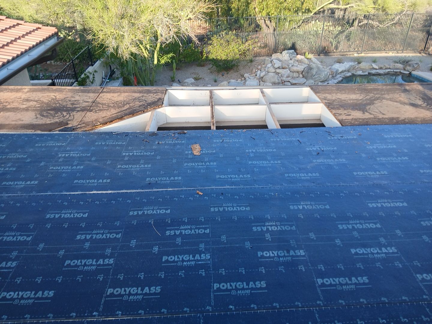 Residential Tile Roof Restoration and Low Slope Membrane Replacement in Tucson by West Coast Roofing AZ