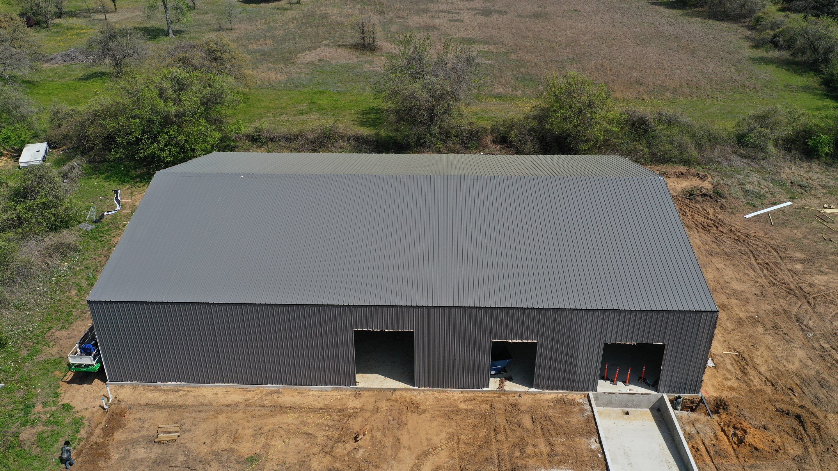 DYCHE INDUSTRIAL SERVICES metal building by Sky Roofing and Remodeling LLC
