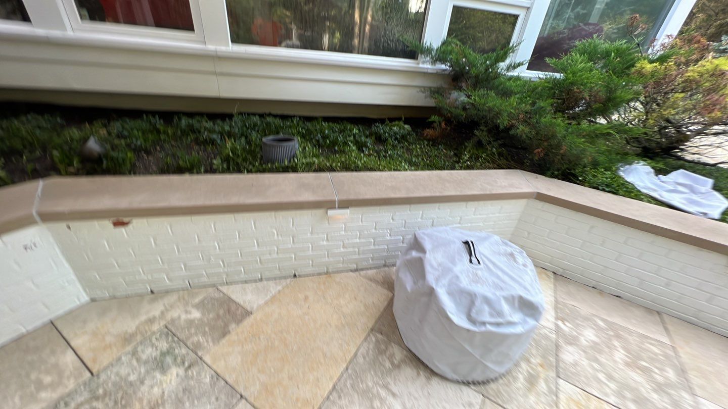 marble patio cleaning and sanding using Polysweep polymeric sand by Northern Power Washing LLC.