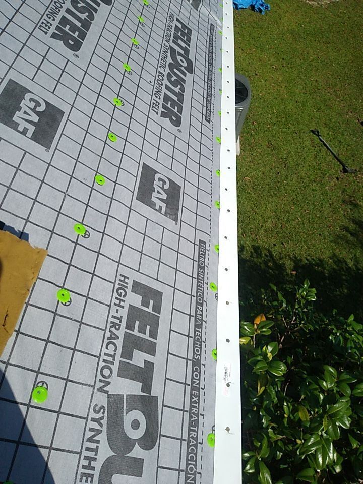 Residential Roofing Installation using Roof Replacement by American Roofing & Construction LLC