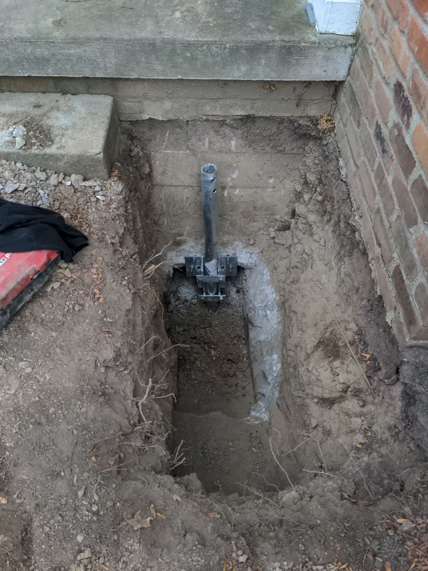 Helical Piers and Pillar Lift using Helical Foundation Footings by Toledo Basement Repair
