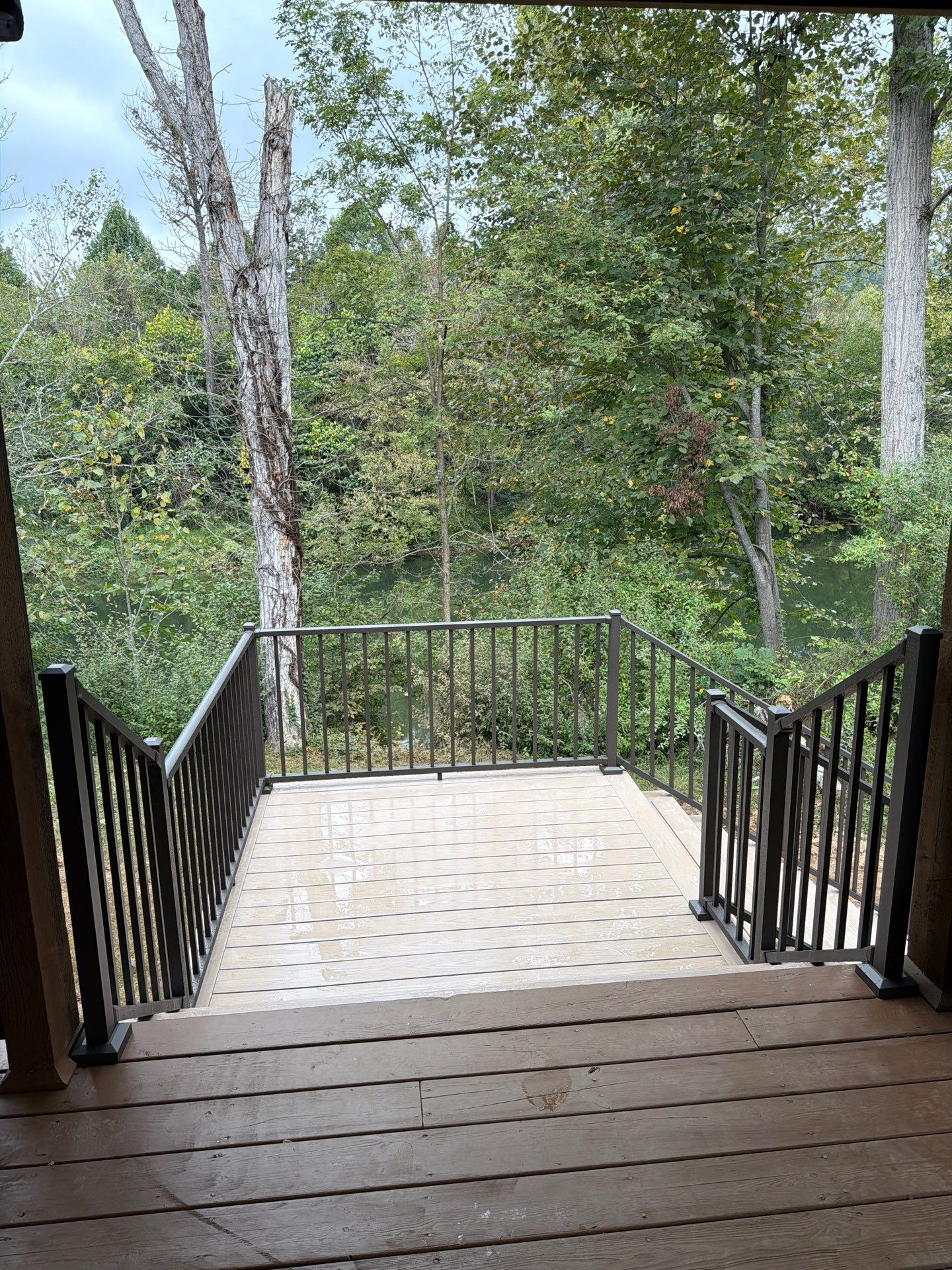 Log Cabin Wrap-Around Deck and External Staircase Installation in Caldwell by Walnut Hollow Decks & Outdoor Living