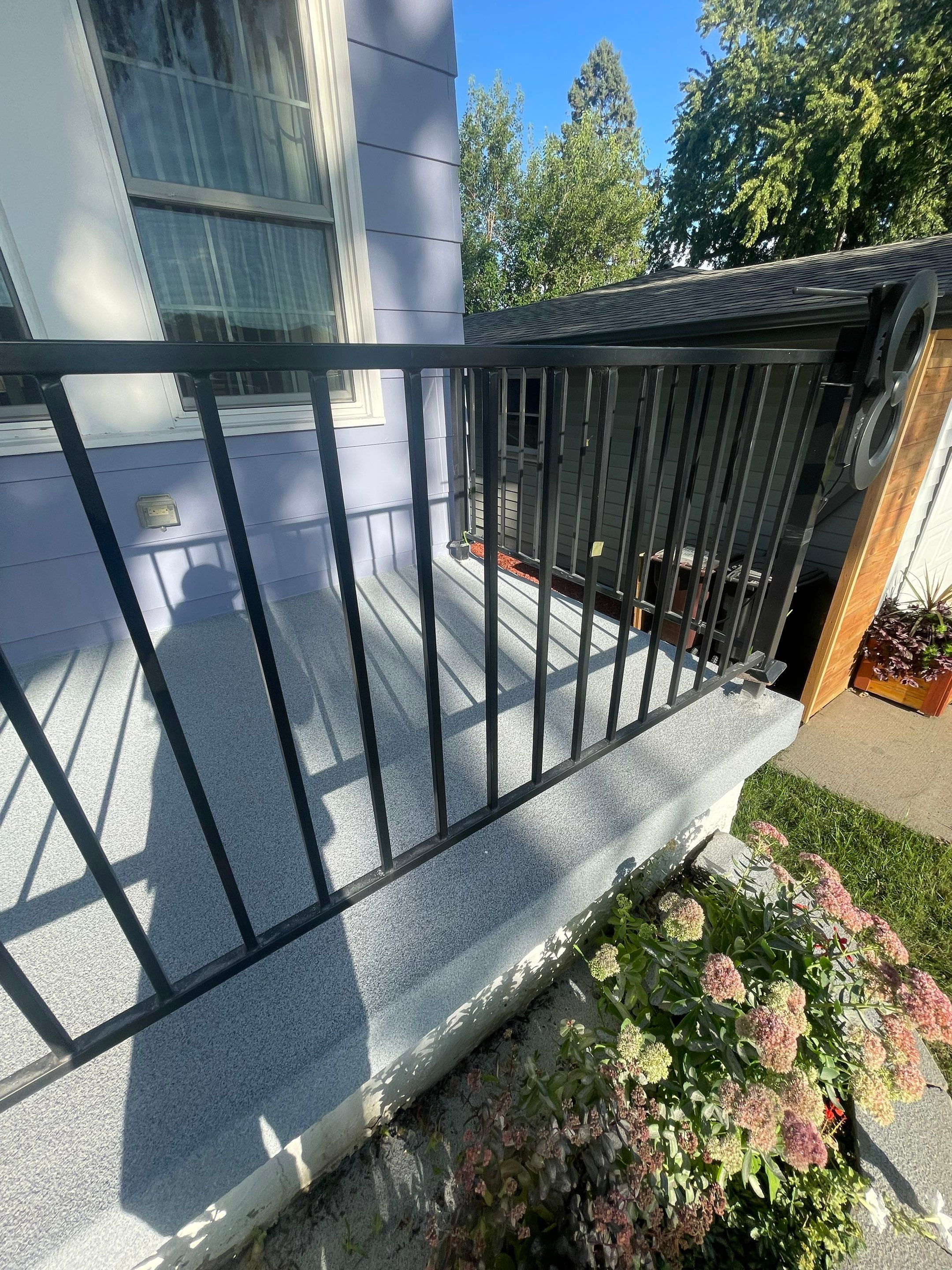 Sioux Falls Concrete Porch Coating with Starry Evening Finish by Select Painting, Coatings & Garage Cabinets