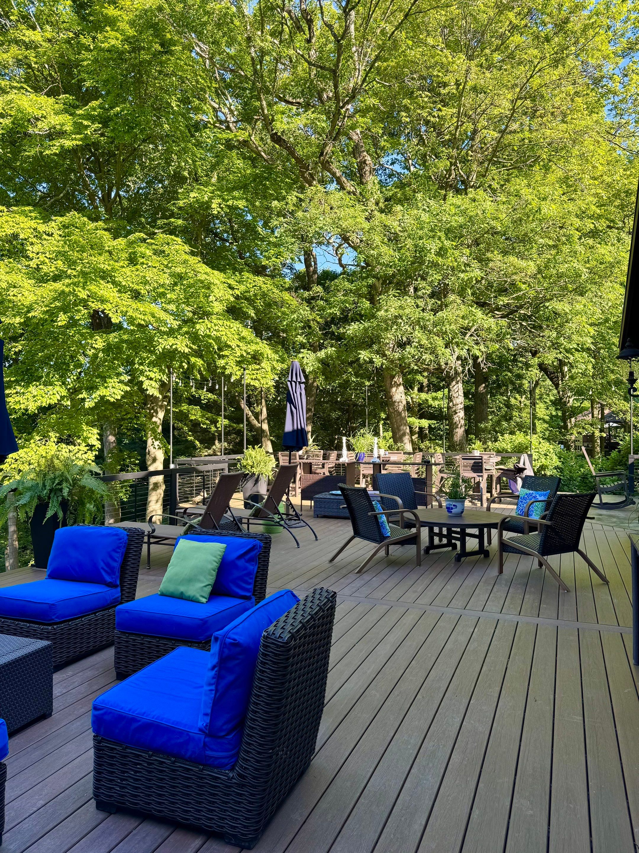 1500 sq/ft Composite Deck Build with Outdoor Kitchen in Champion by Cousins Roofing Siding & Decks
