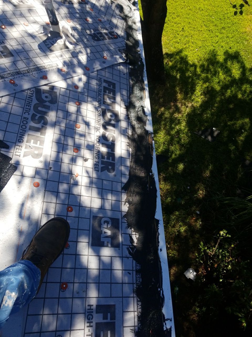 Residential Roofing Installation using Roof Replacement by American Roofing & Construction LLC
