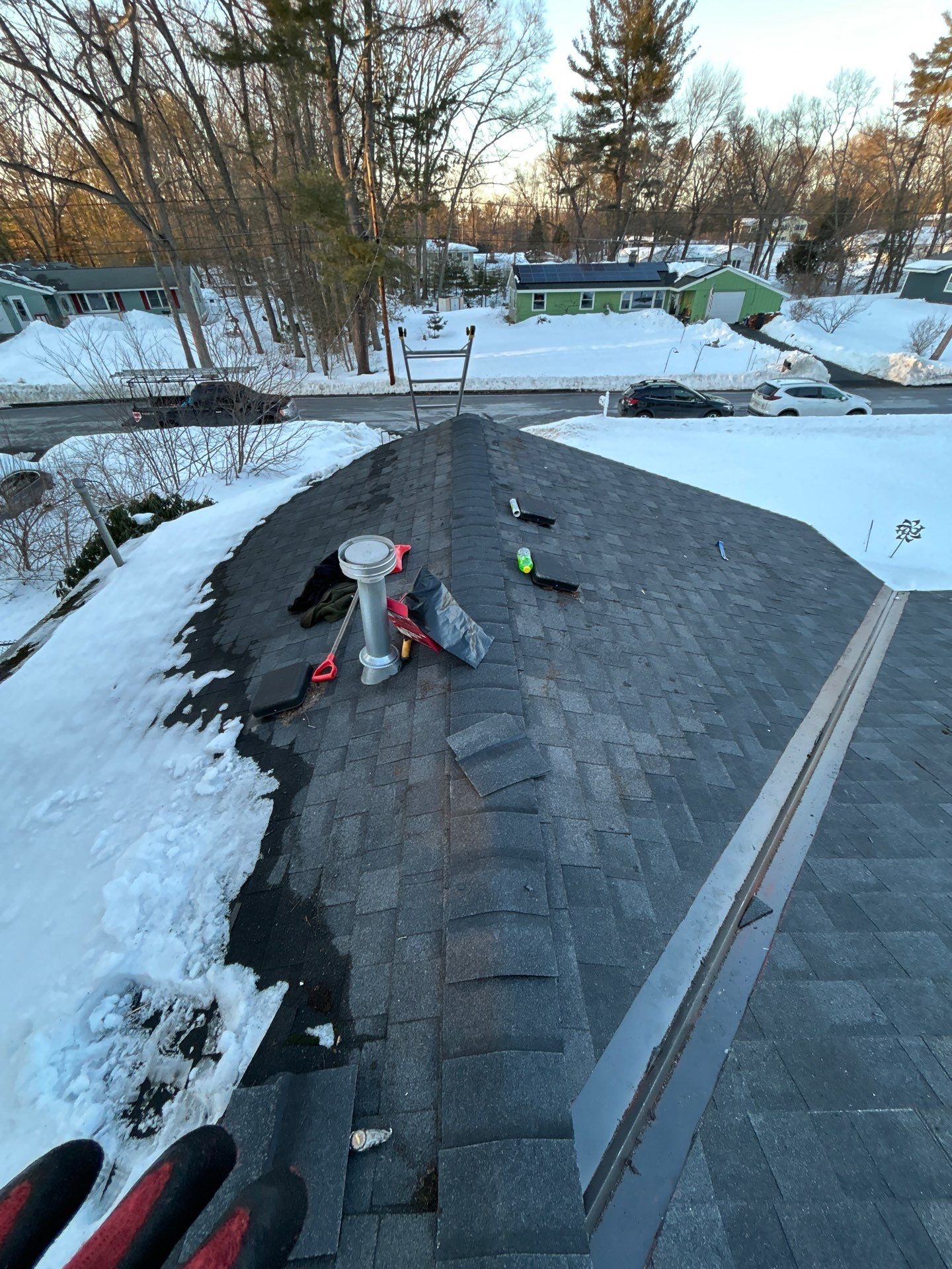 Ridge Cap Replacement & Black Metal Valley Installation in Chelmsford, MA by Mighty Dog Roofing of Greater Middlesex County
