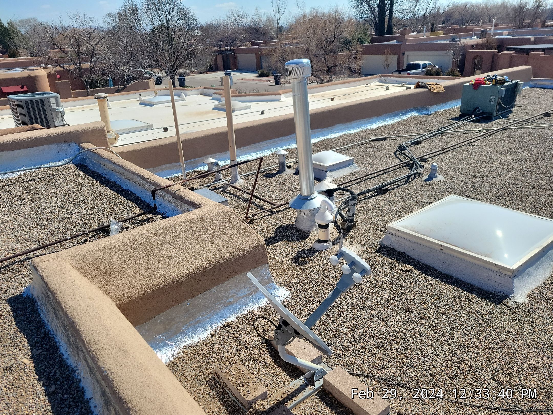 Roof Maintenance and Low-E Tempered Glass Skylight Replacement on Gravel Roof in Northwest Albuquerque by Doyle Roof Masters Inc