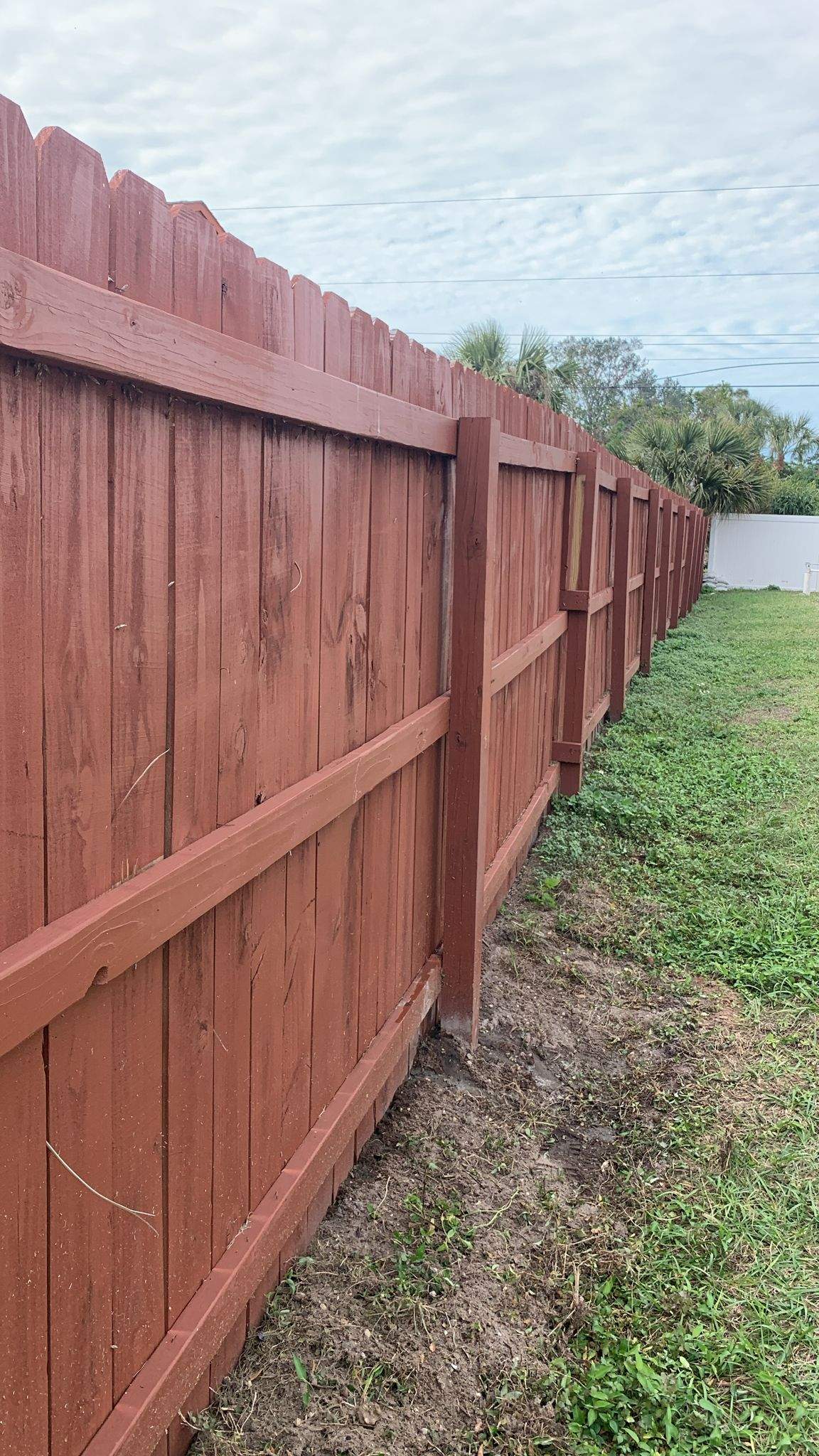 Red-Stained Wood Privacy Fence and Gate Repair in Venice by True Fence LLC
