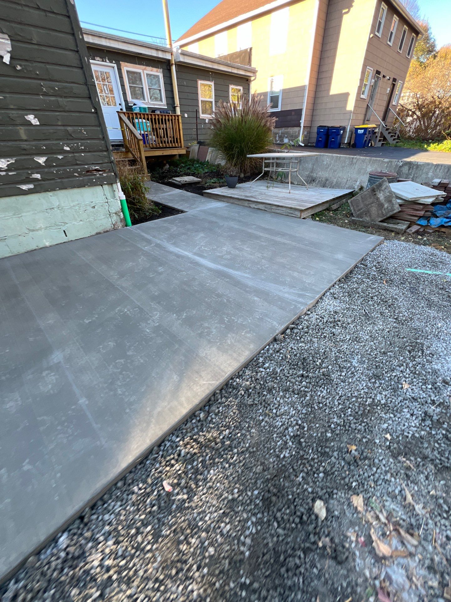 Broom finished concrete patio  by NG Masonry & Construction LLC