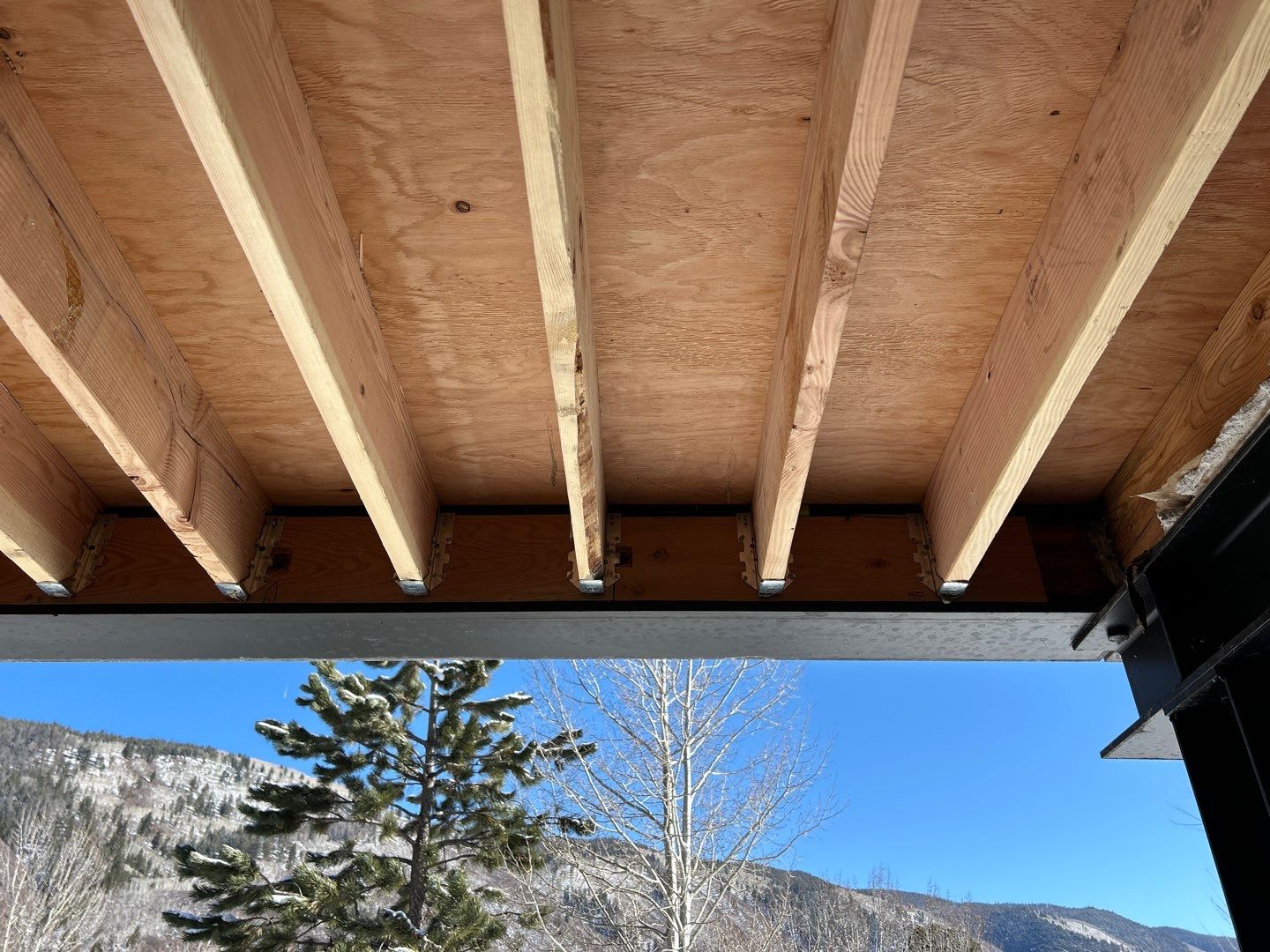 Deck repair & complex lighting install in Aspen by Roaring Fork Property Group 