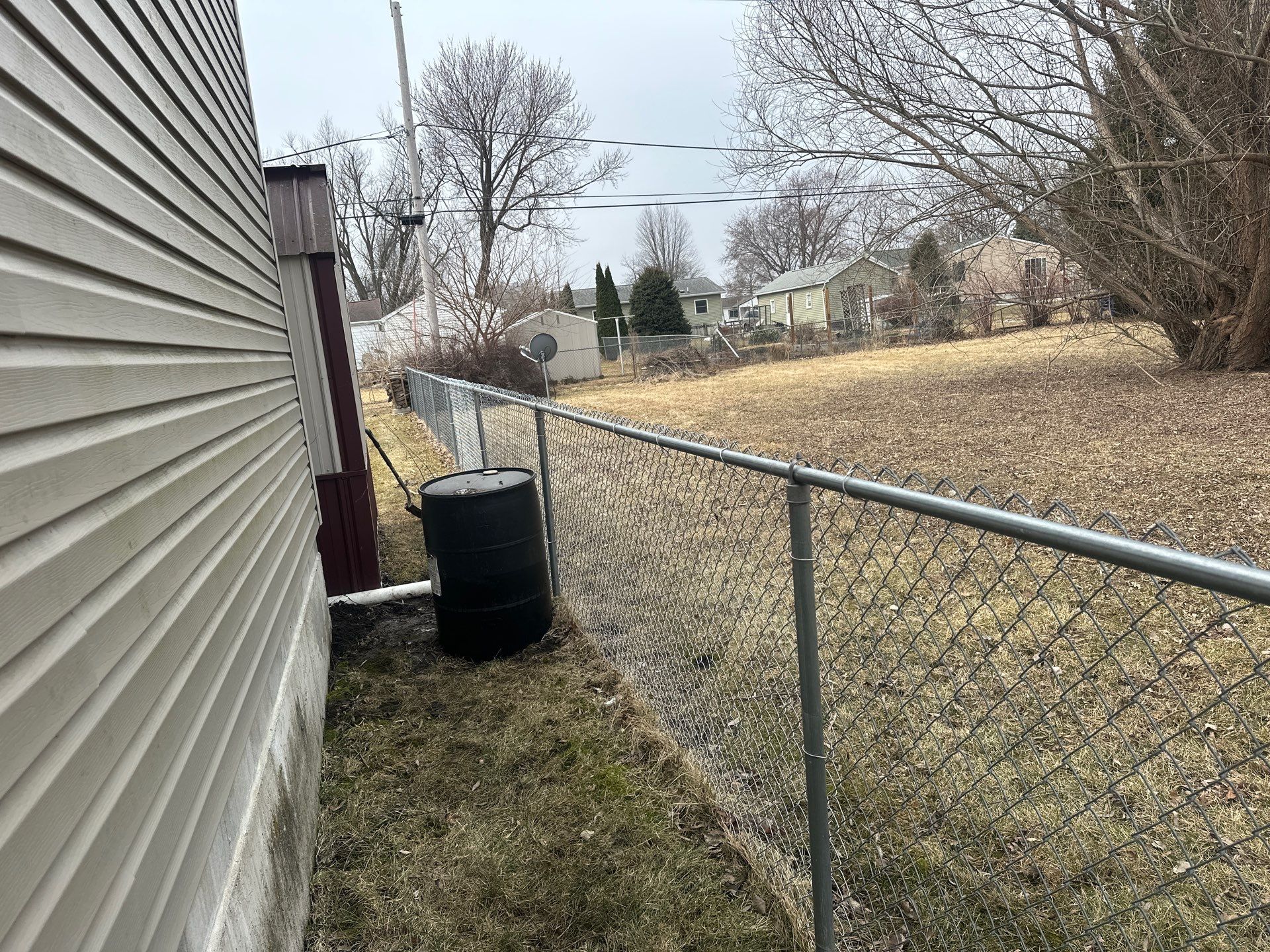 Galvanized Chain Link Fence and Vinyl Gate Installation in Washburn by Perfect Picket Fence and Stain