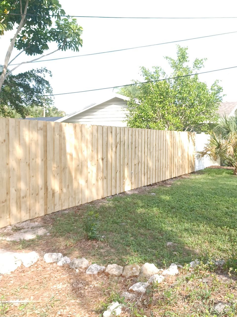 Sarasota, FL 6ft. Tall Treated Board on Board Wood Fence by Asap fence and gates, LLC