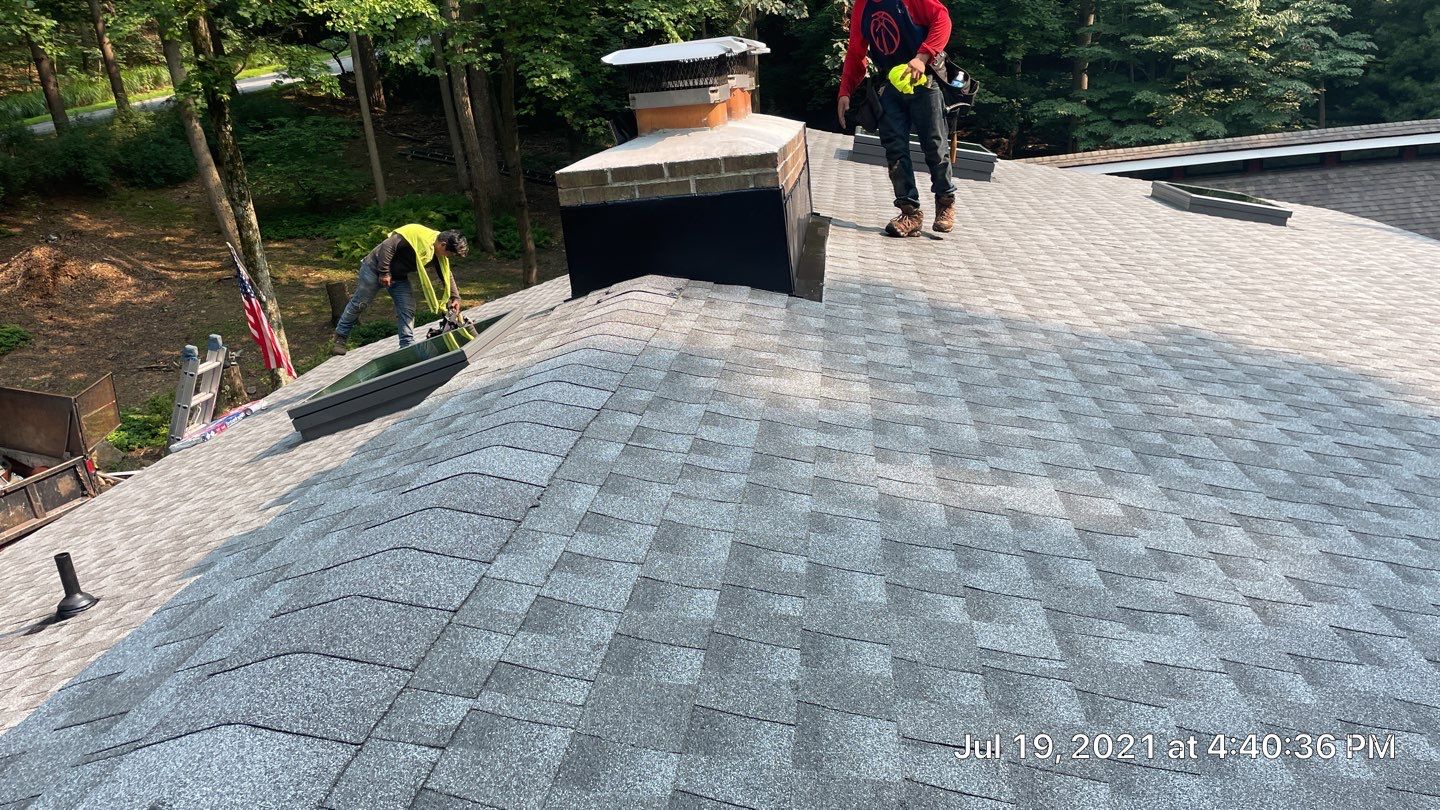 Deckhouse Roof Replacement by American Home Contractors