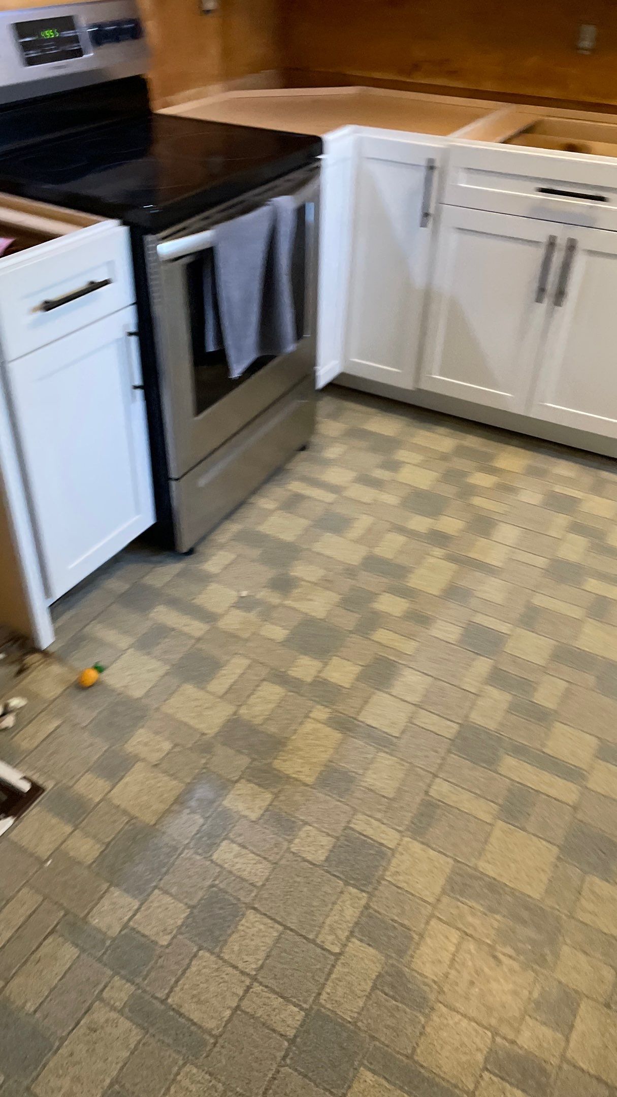 Kitchen Backsplash and Herringbone Tile Floor Remodel by Footprints Floors of Coastal Carolina