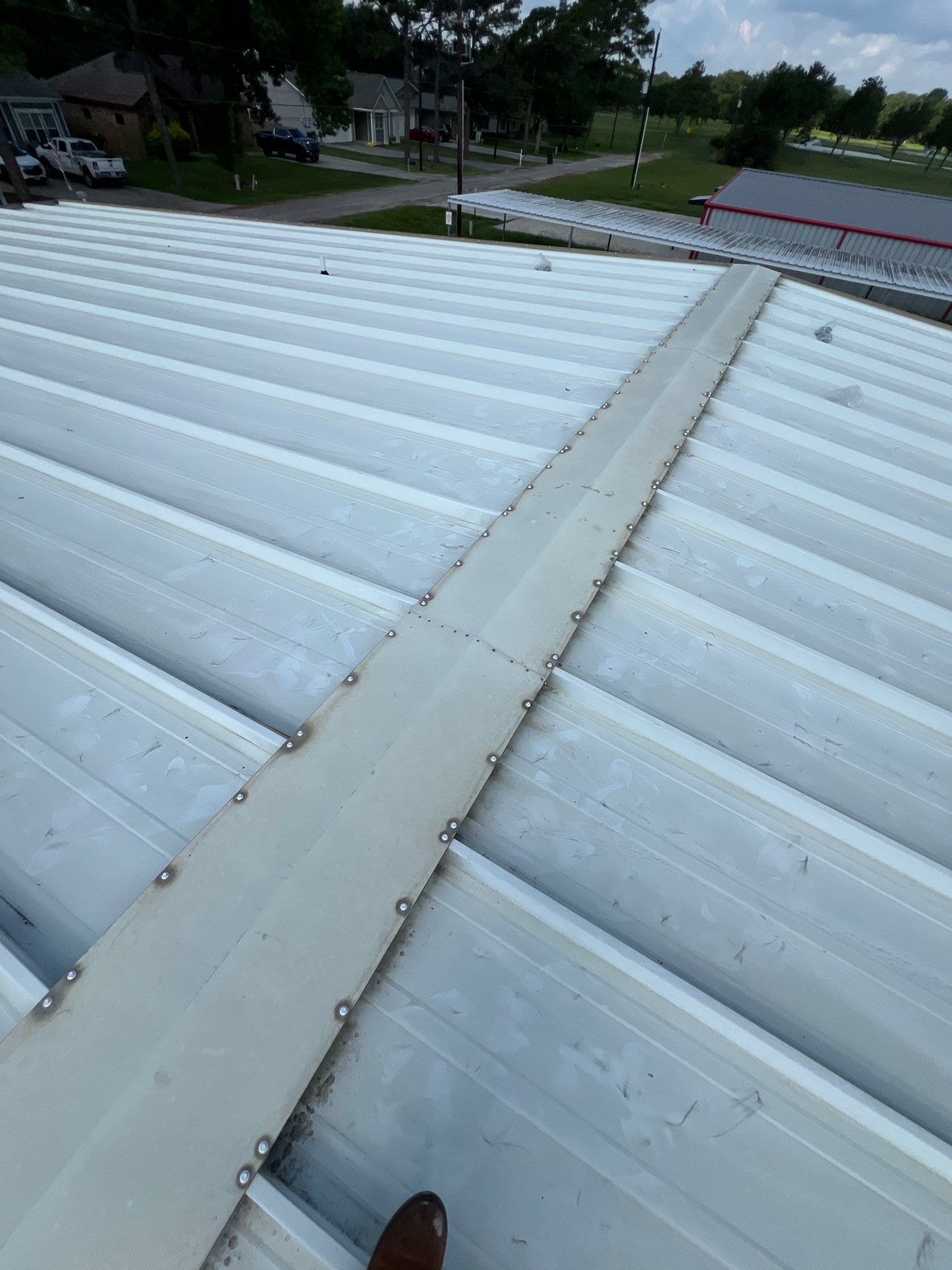 Commercial Roofing Repair using Metal by Roof Repair Company