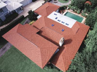 Cocoa Residential Roof Replacement Featuring Integrated Skylights and Flat Roofing