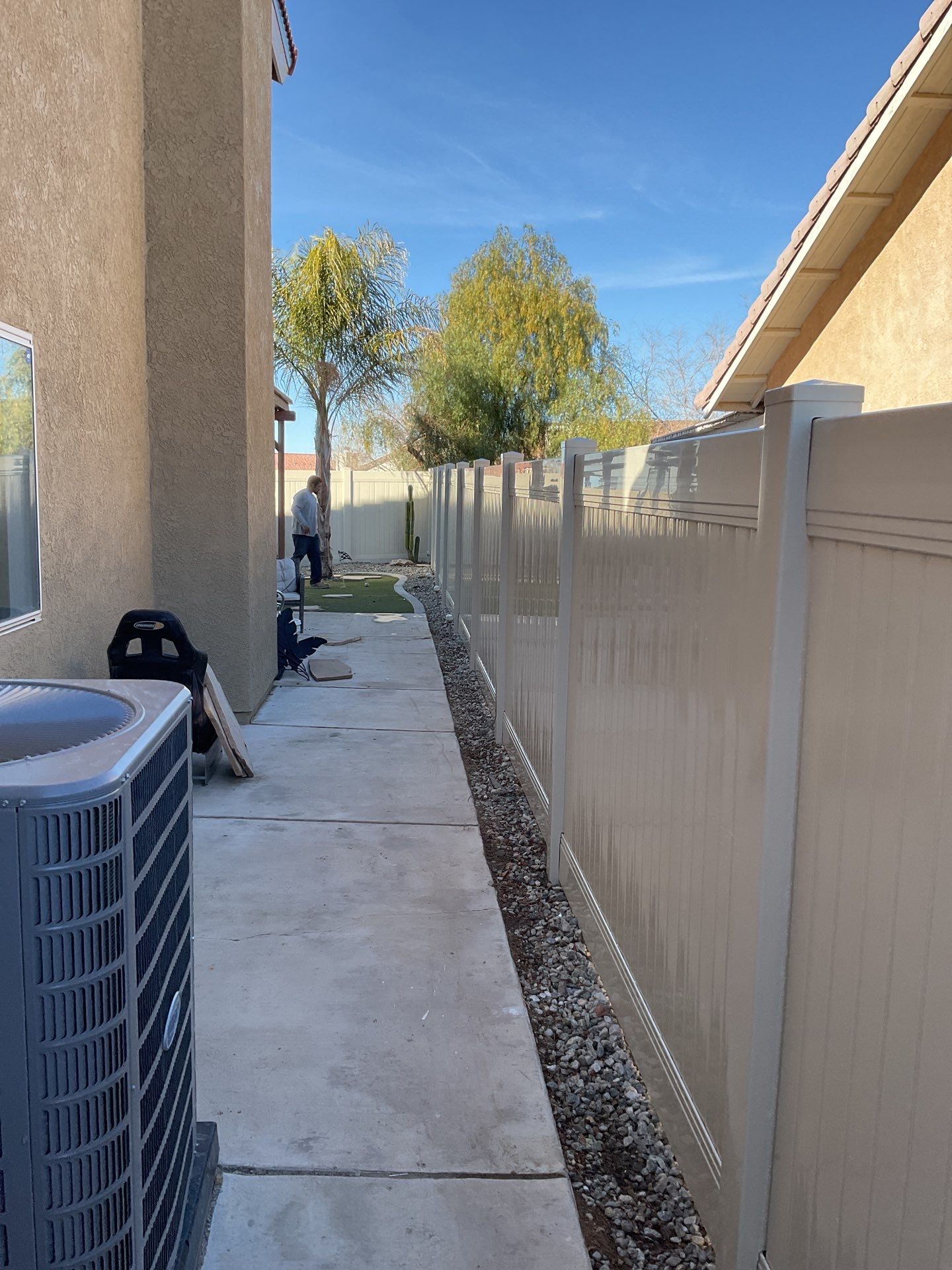 Beautiful vinyl fence installation by Fence Guys Inc.