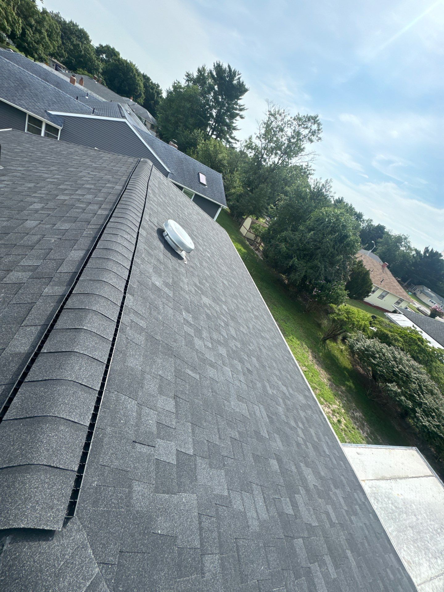 Estate Gray Shingles by Reimagine Roofing