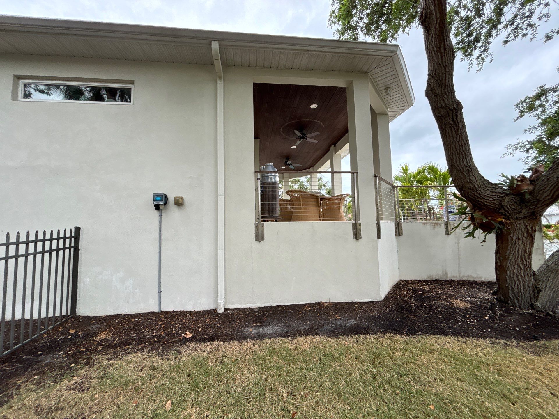6-Inch White Seamless Gutters Installation in Siesta Key FL by Gutter Professors
