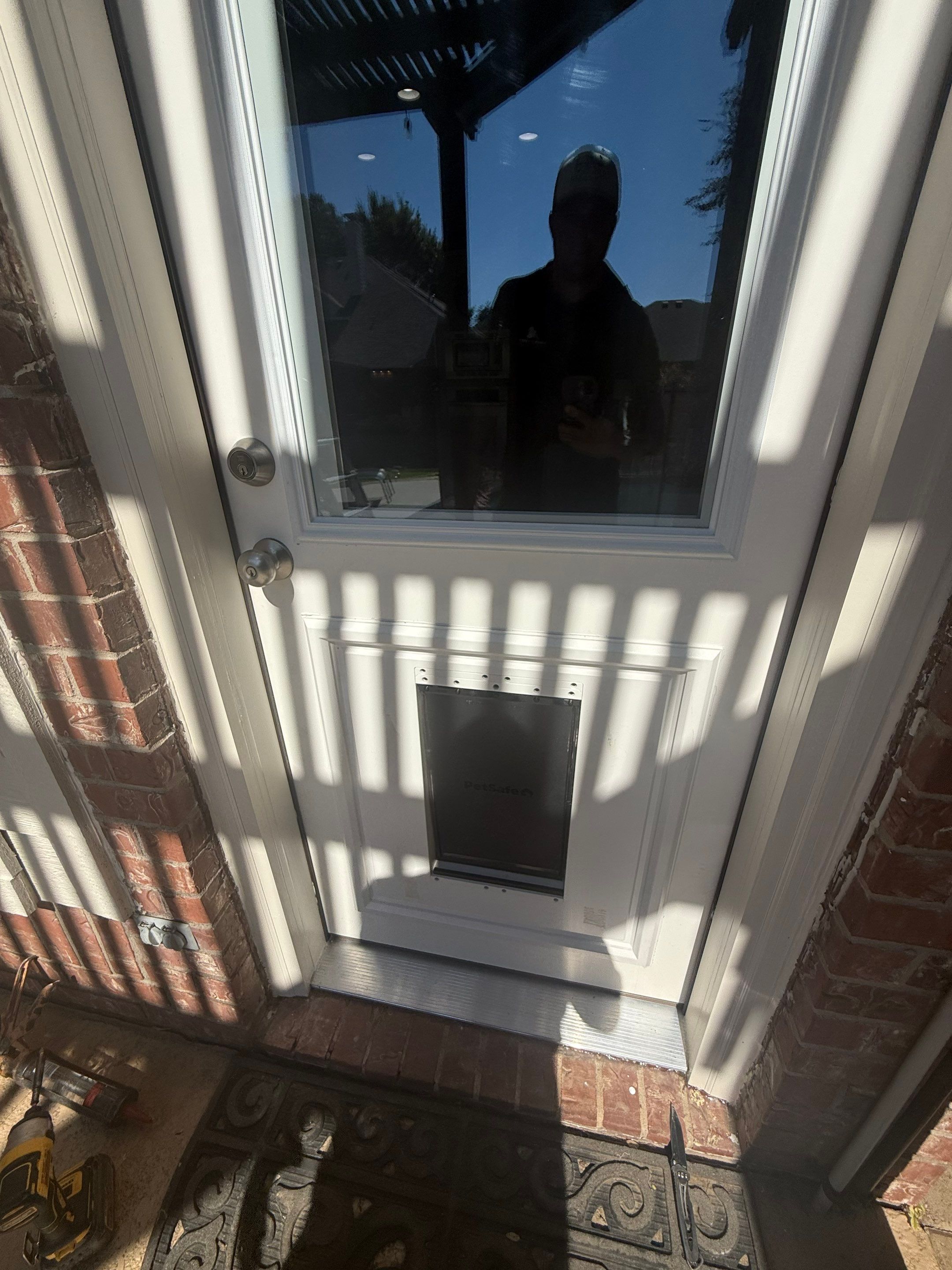 Dog Door Replacement by First Out Roofing 